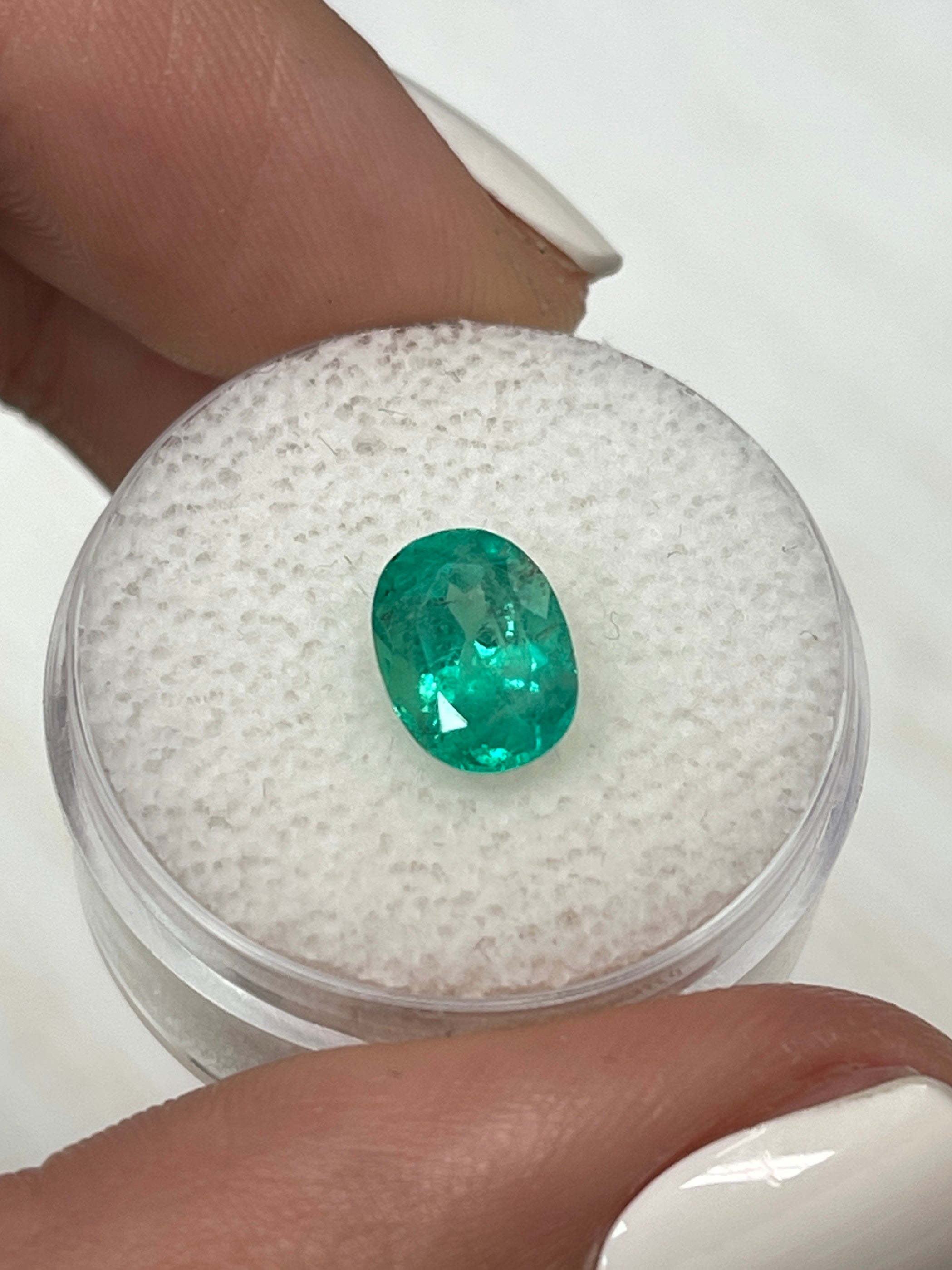 1.74 Carat 9x7mm Natural Colombian Emerald Oval Cut Loose Gemstone - Bluish Green with Freckles for Jewelry Making & Engagement Rings