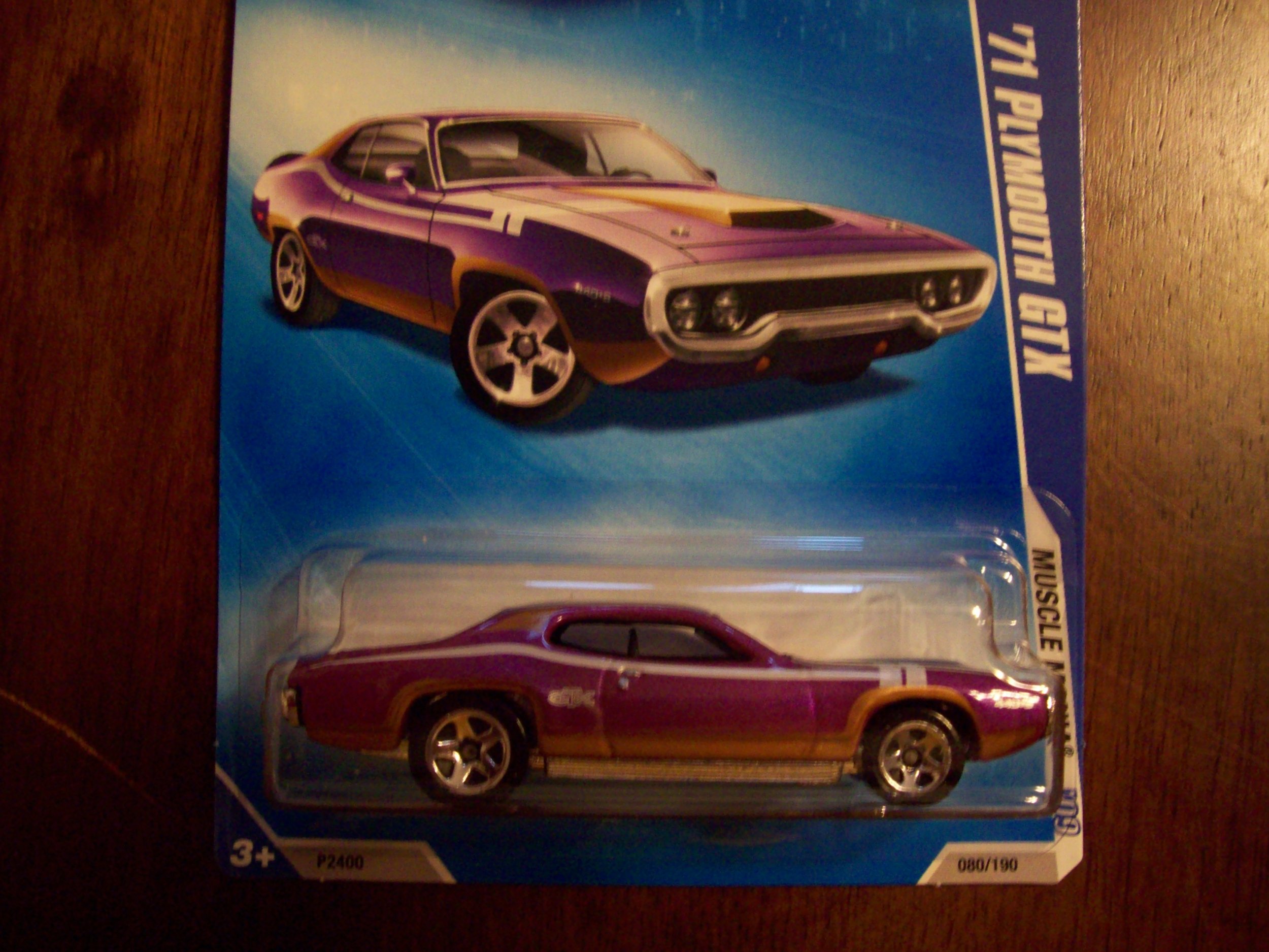 Hot Wheels 2009 Muscle Mania 1971 Plymouth GTX 1:64 Scale Die-Cast Model Car - Collectible Toy for Kids & Adults, Perfect for Display, Racing & Gifts