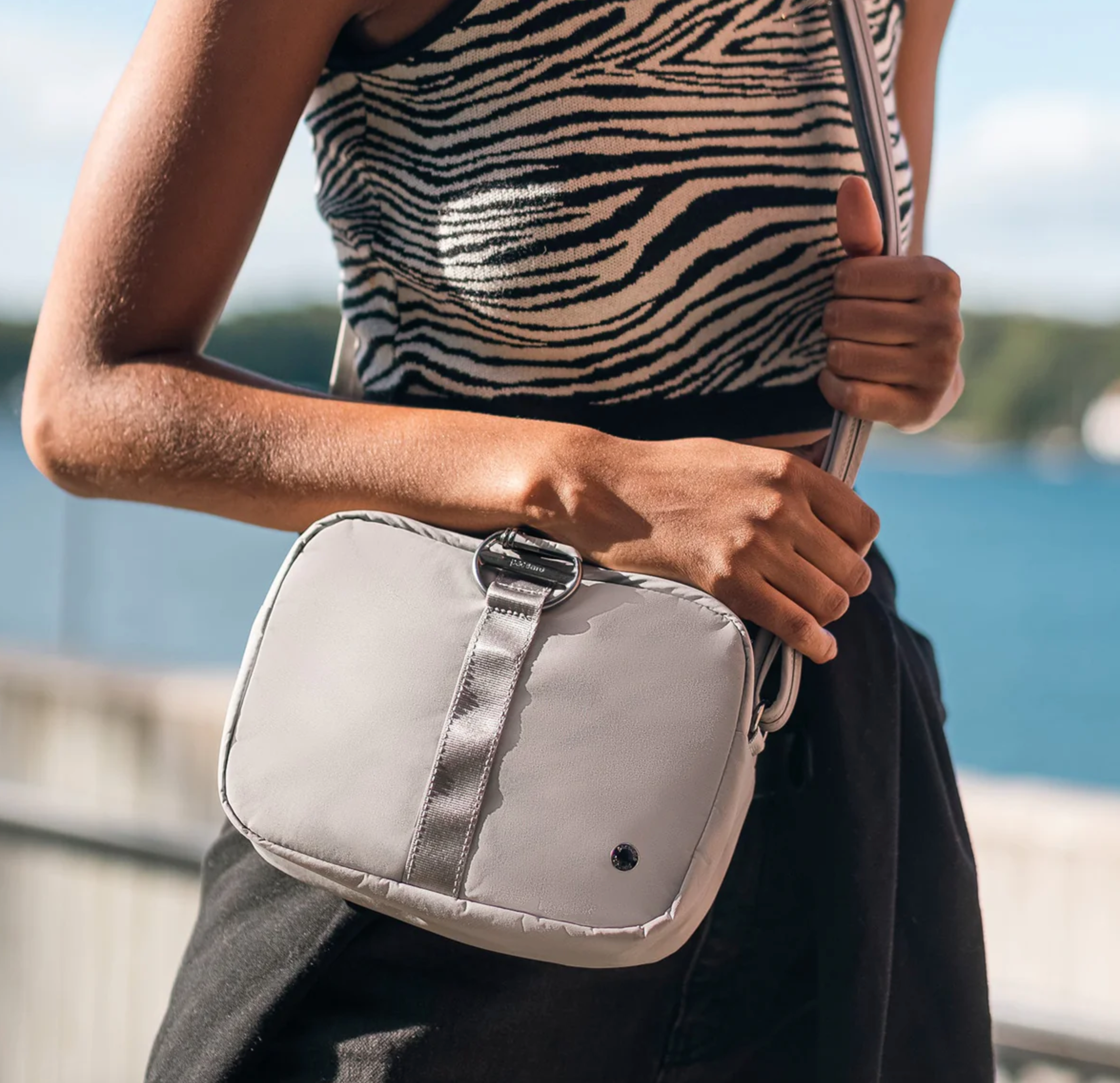 Pacsafe Citysafe CX Anti-Theft Square Crossbody Bag for Women - Secure Travel & Everyday Use | RFID Blocking, Cut-Proof Straps | Perfect for Commuting, Shopping & City Exploration