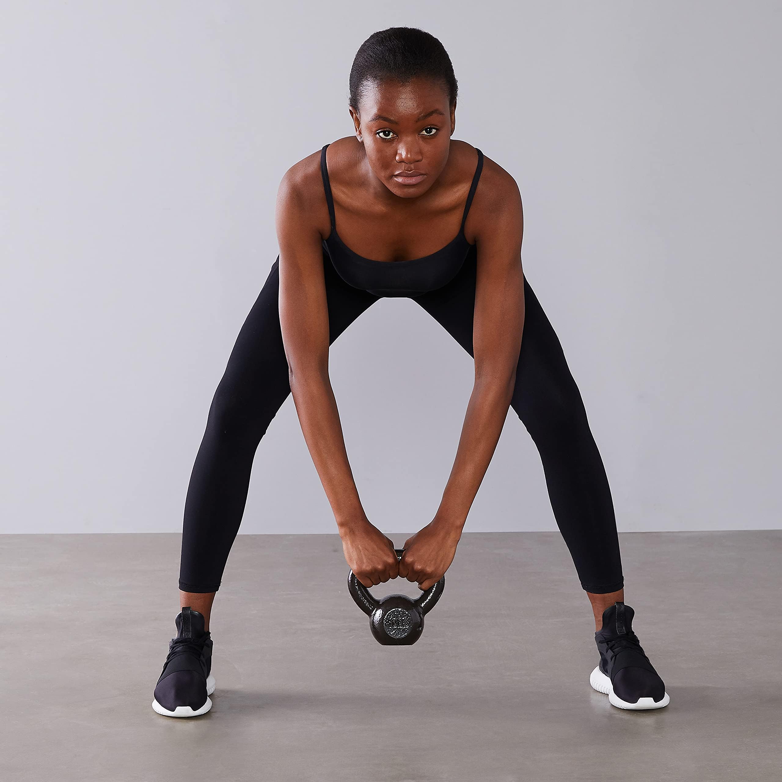 Amazon Basics Cast Iron Kettlebell - 5-50 lbs Weight Options for Home Gym, Strength Training & CrossFit Workouts | Durable Fitness Equipment for Men & Women