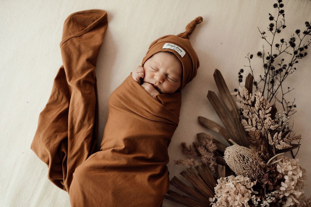 Snuggle Hunny Baby Jersey Wrap & Beanie Set - Soft Cotton Newborn Swaddle Blanket and Hat - Perfect for Hospital Photos, Baby Showers & Cozy Nursery Time (Bronze)