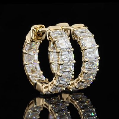 A Tale of Elegance: The Journey of the Emerald Huggie Earrings