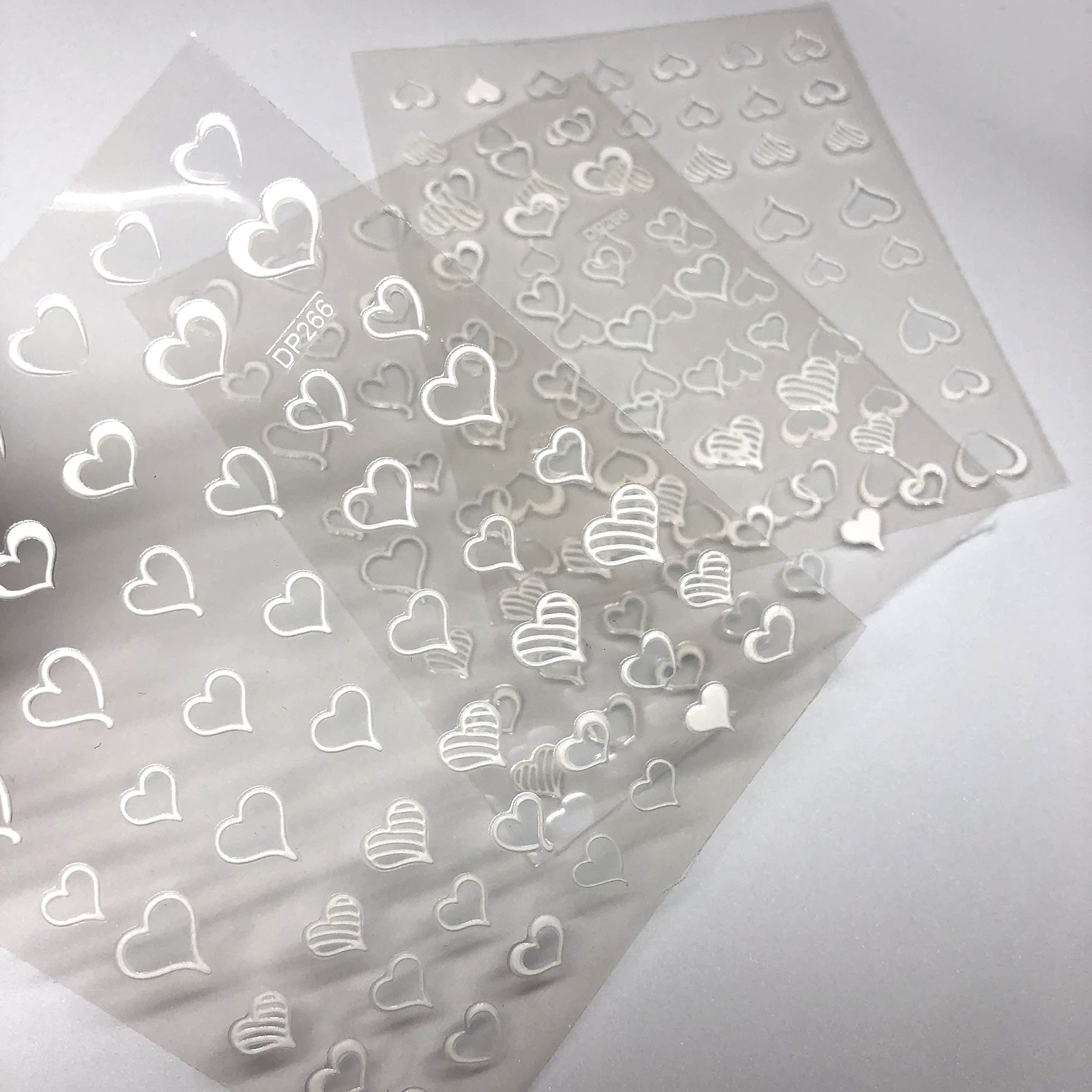 3D Valentine's Day Nail Stickers - White Heart, Love Butterfly & Cherry Blossom Nail Art Decals for Women | Solid & Hollow Heart Designs | Manicure Decor Sheets | Perfect for Romantic Dates, Weddings & Special Occasions (White)