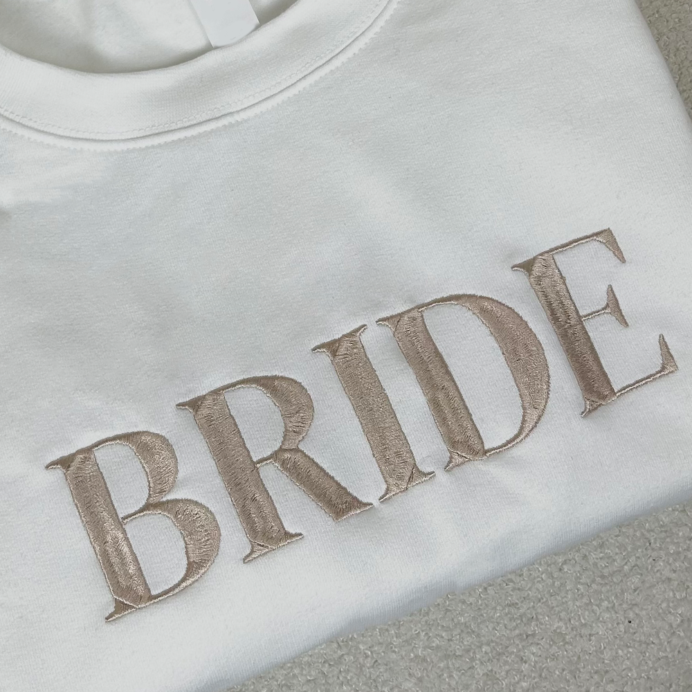 Champagne Embroidered Bride Women's Sweatshirt - Elegant Bridal Party Outfit for Wedding, Bachelorette & Bridal Shower