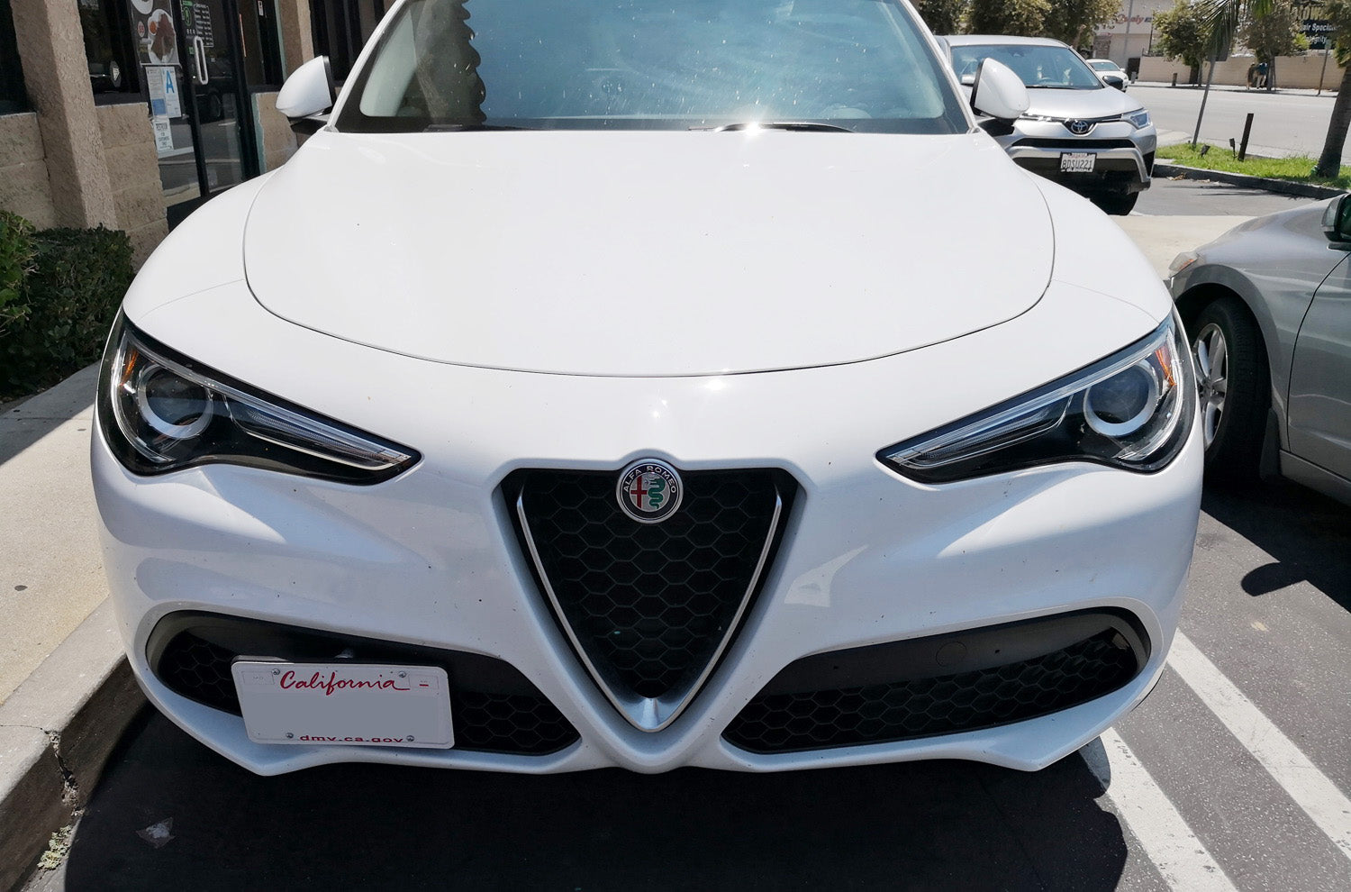 Alfa Romeo Stelvio Front Bumper Tow Hook License Plate Mount Bracket (2018-2023) - Durable & Easy Installation for Custom Car Styling - Perfect for Off-Roading & Car Shows