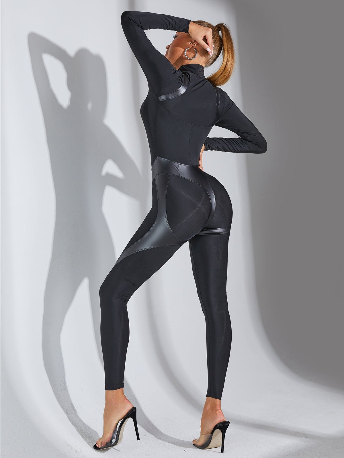ZASUWA Women's Faux Leather Jumpsuit with Stand Collar & Zipper Closure - Stylish One-Piece Outfit for Work, Party & Night Out