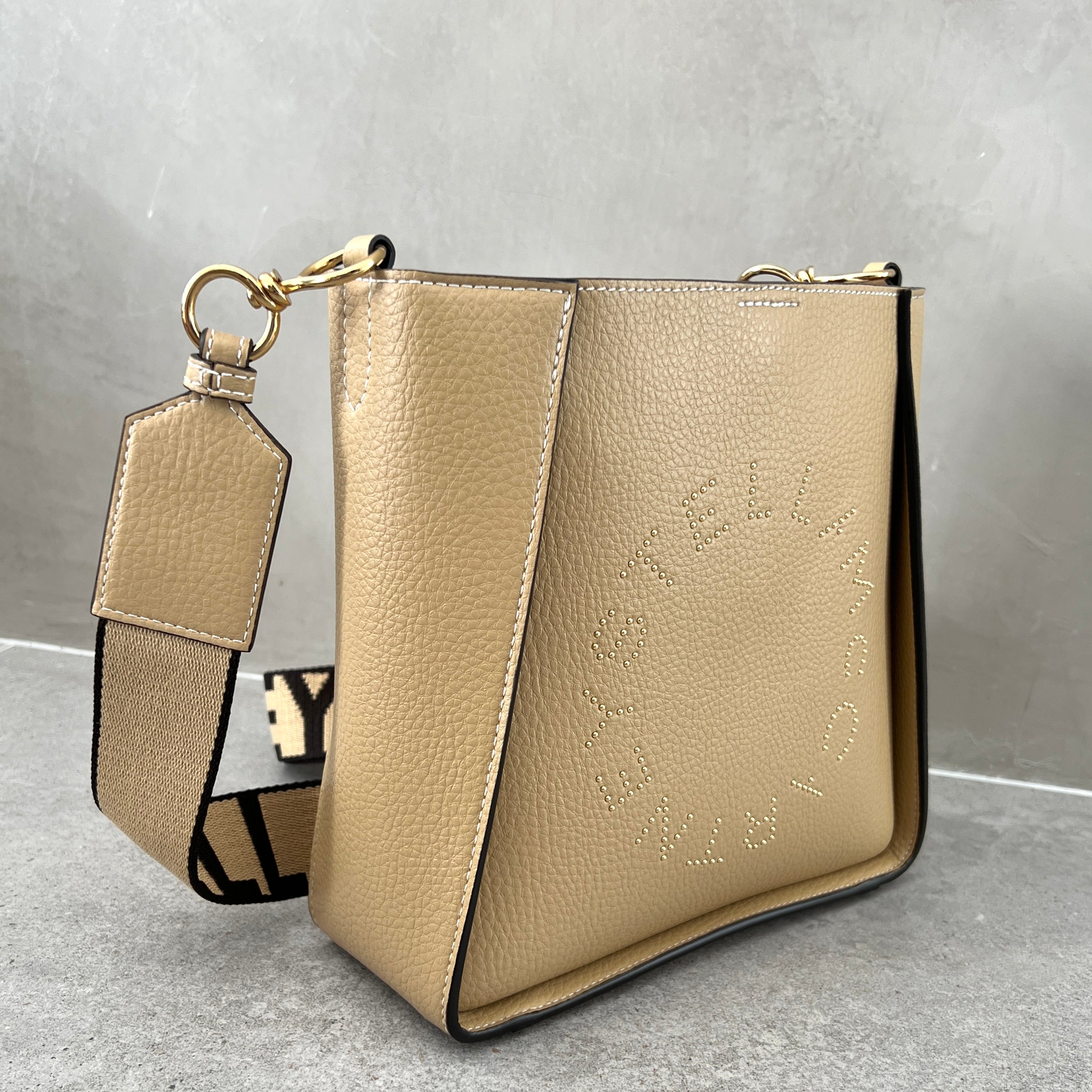 Stella Logo Mini Crossbody Hobo Bag with Grain Studs in Caramel - Stylish & Compact Purse for Women, Perfect for Everyday Use, Travel & Casual Outings