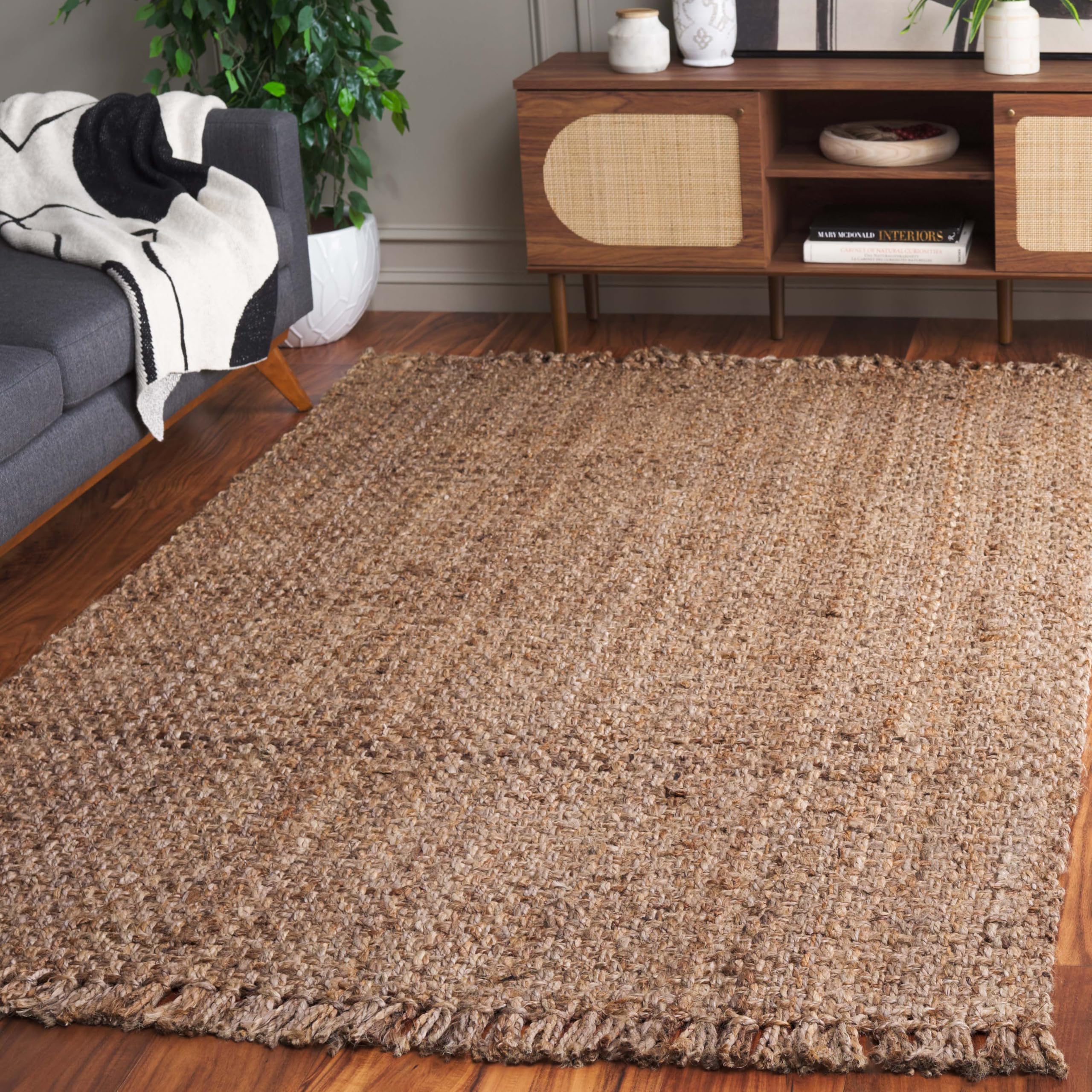 SAFAVIEH Handmade Jute Area Rug 5' x 8' - Natural Fiber Tassel Border, Non-Slip Living Room & Bedroom Rug, Eco-Friendly Home Decor for High Traffic Areas (NF467A) | Perfect for Boho Chic, Farmhouse & Coastal Style Interiors