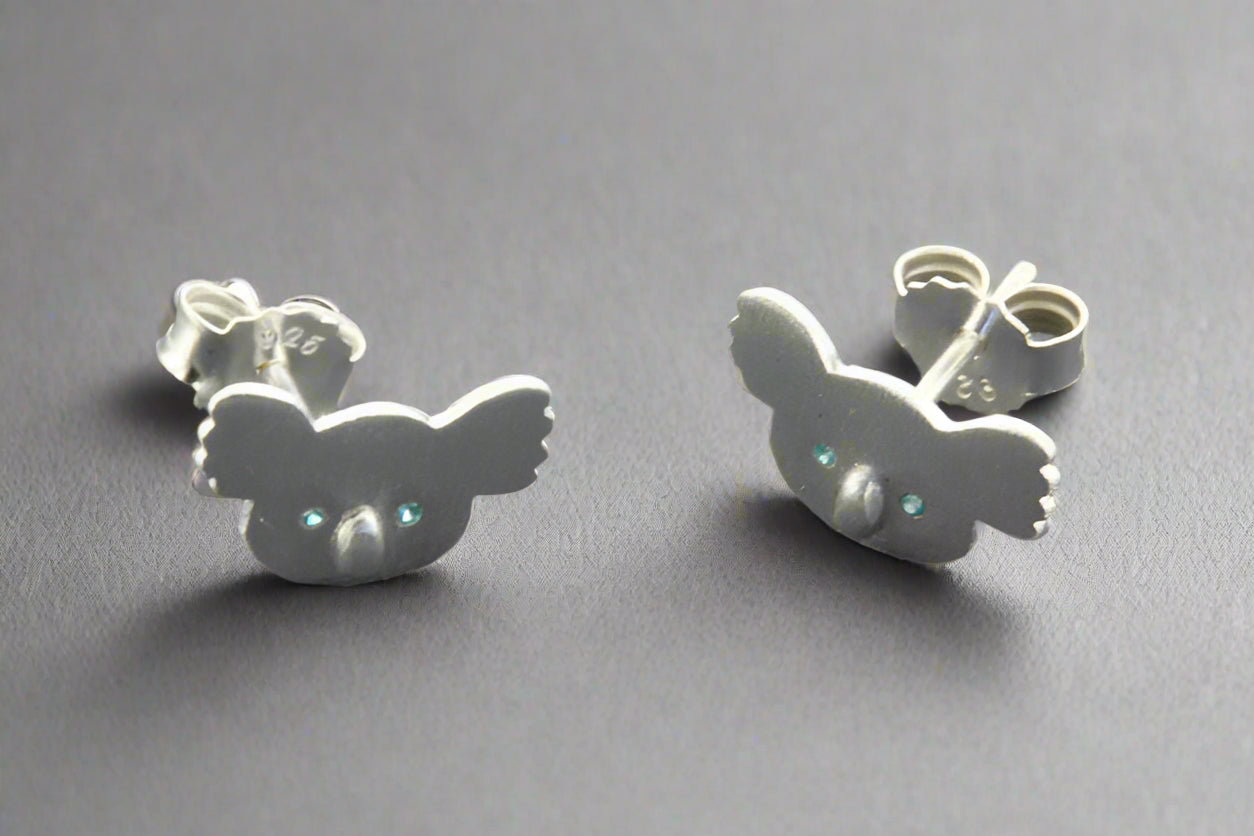 Koala Face Stud Earrings with Blue Eyes - Sterling Silver Jewelry for Women - Perfect for Casual Wear & Gifts