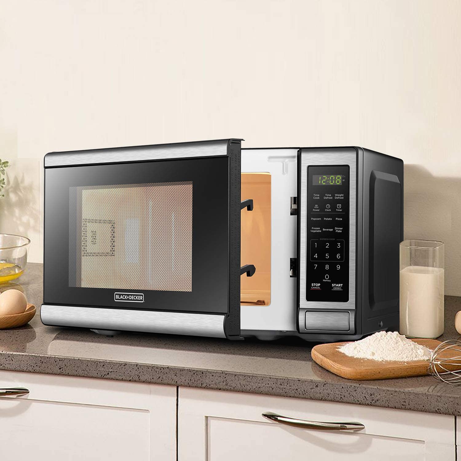 BLACK+DECKER 0.7 Cu. Ft. Stainless Steel Digital Microwave Oven - 700W Countertop Microwave with Child Lock & 10 Power Levels - Perfect for Small Kitchens, Dorms & Offices (EM720CB7) - Blemished Packaging with Full Warranty