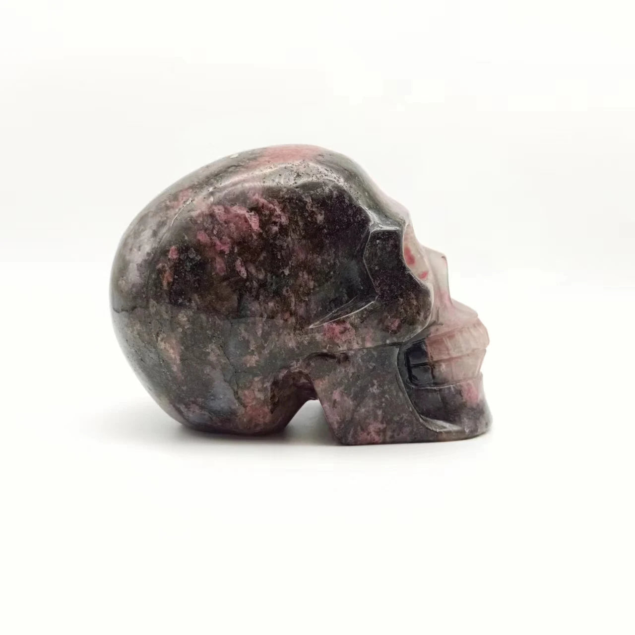 Natural Dark Rhodonite Skull Healing Crystal - Hand-Polished Gemstone Sculpture for Home Decor, Meditation, and Halloween Gifts | Spiritual Healing, Altar Decor, Unique Present