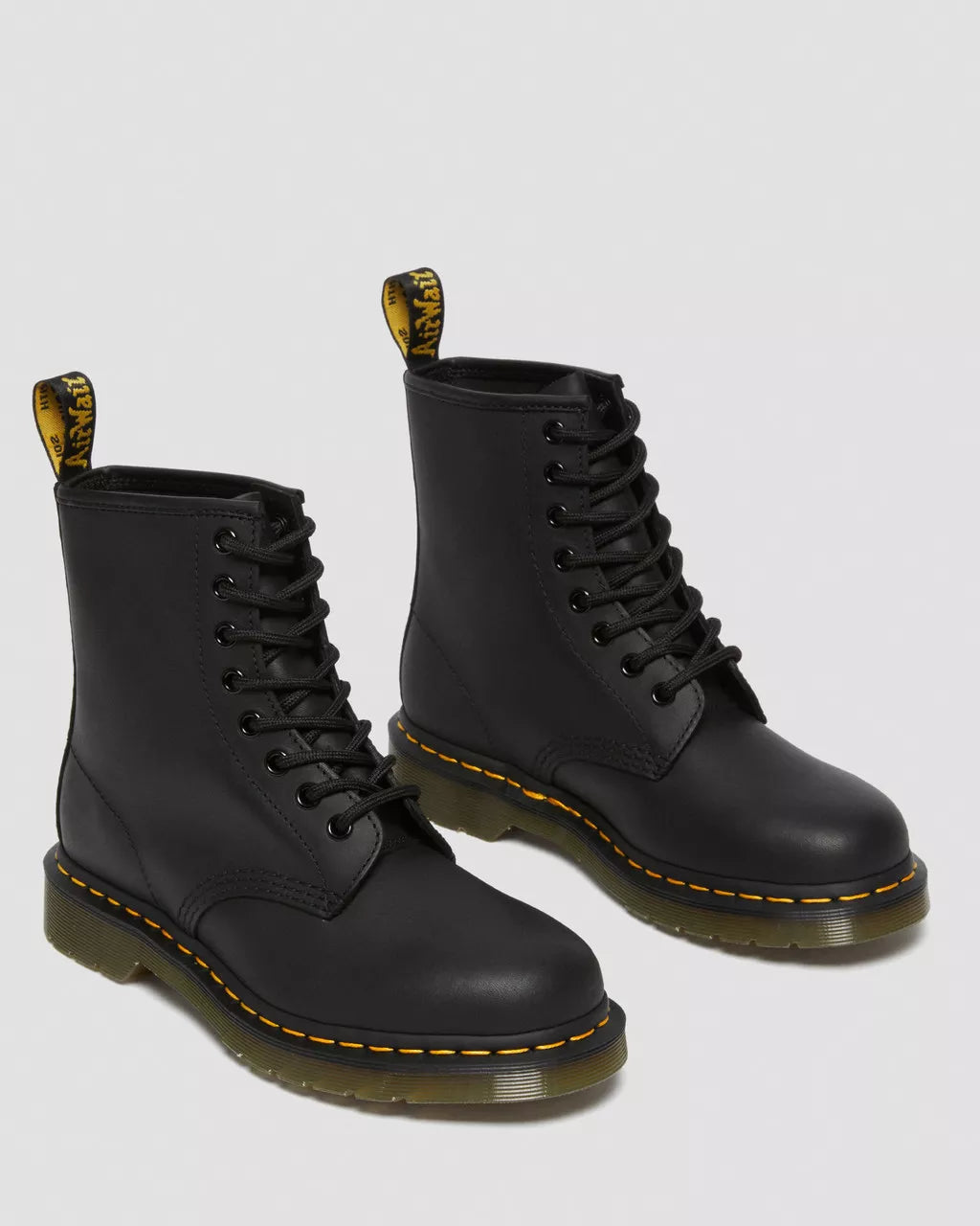 Dr. Martens 1460 Black Greasy Leather Lace-Up Boots for Men & Women - Classic 8-Eye Combat Boots for Punk, Gothic & Everyday Wear