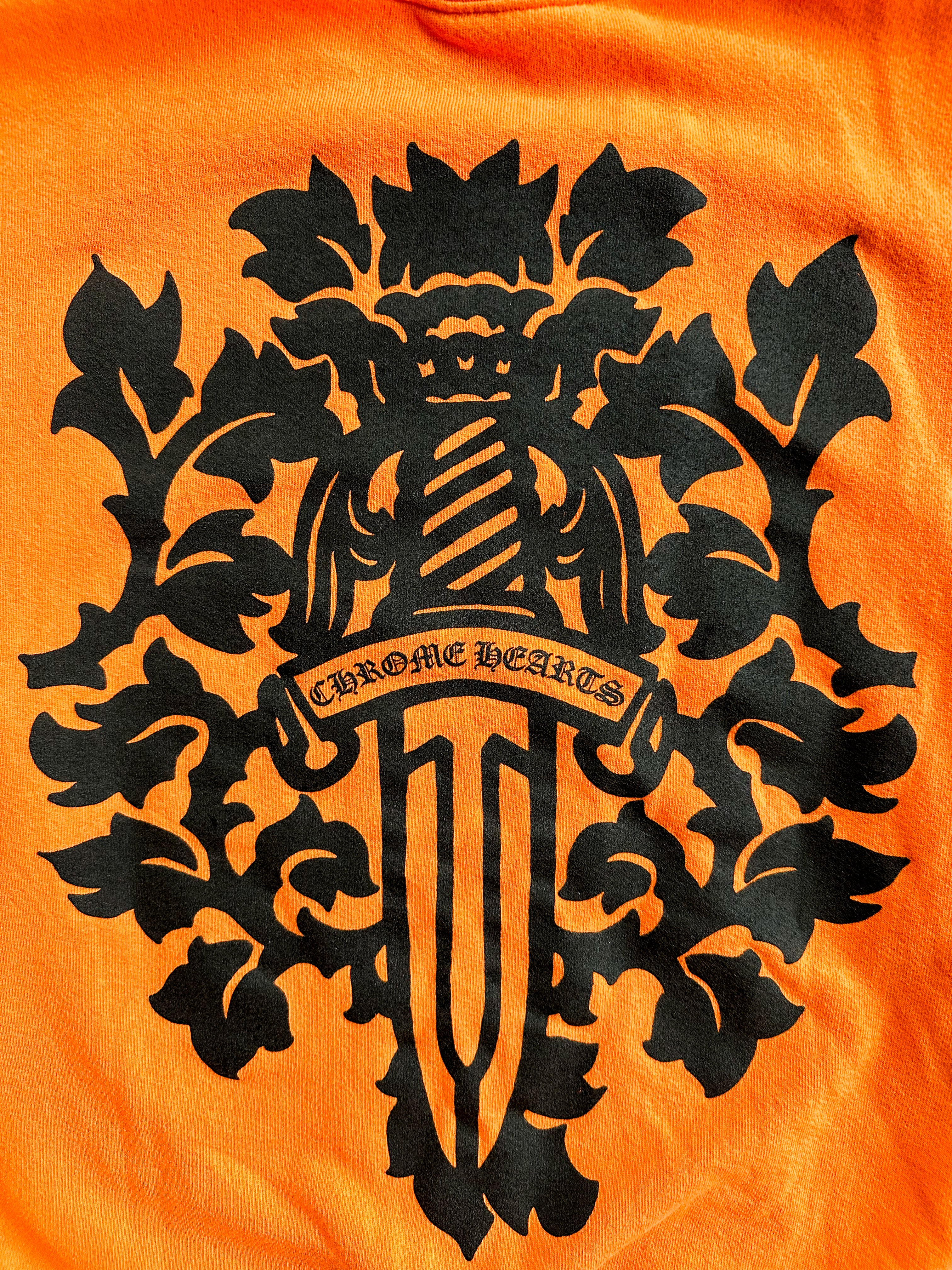Chrome Hearts Orange & Black Dagger Logo Sweater - Stylish Gothic Knitwear for Men & Women | Perfect for Streetwear, Concerts & Fashion Statements