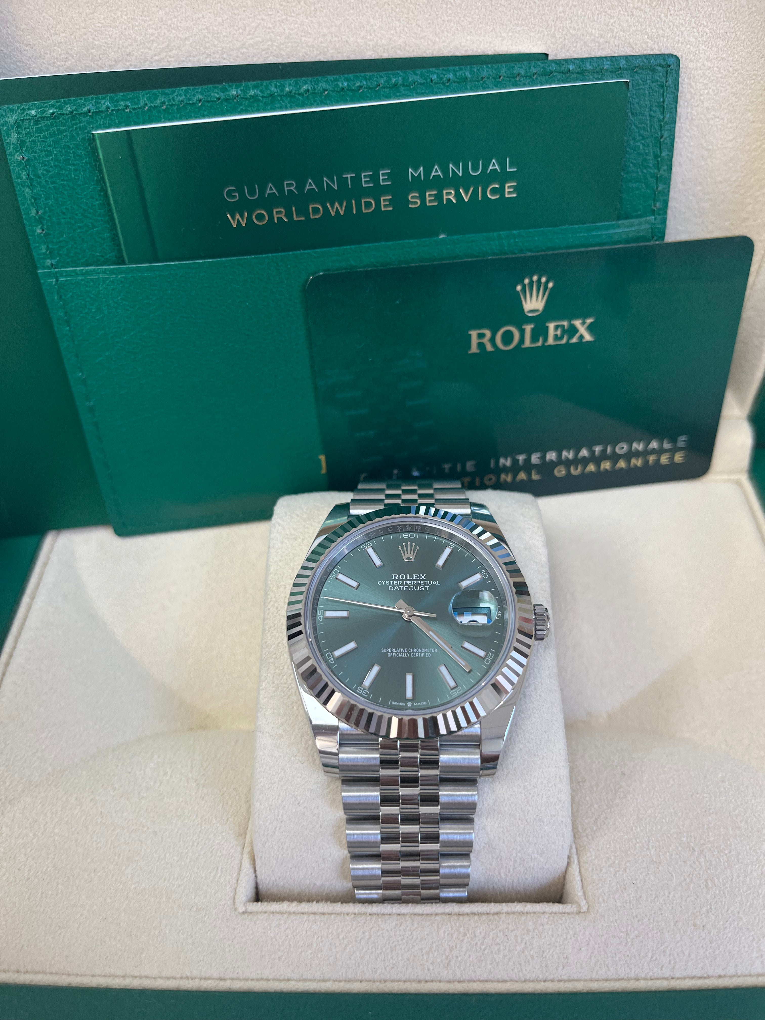 Rolex DateJust 41mm Oystersteel Watch with Mint Green Dial, Fluted Bezel & Jubilee Bracelet (Ref.126334) - Luxury Dress Watch for Business & Formal Occasions