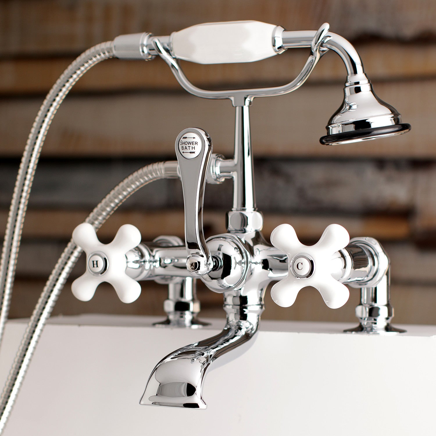 Vintage Style 3-Handle 2-Hole Deck Mount Clawfoot Bathtub Faucet with Hand Shower in Polished Chrome - Perfect for Antique Bathroom Renovations and Luxury Spa Retreats