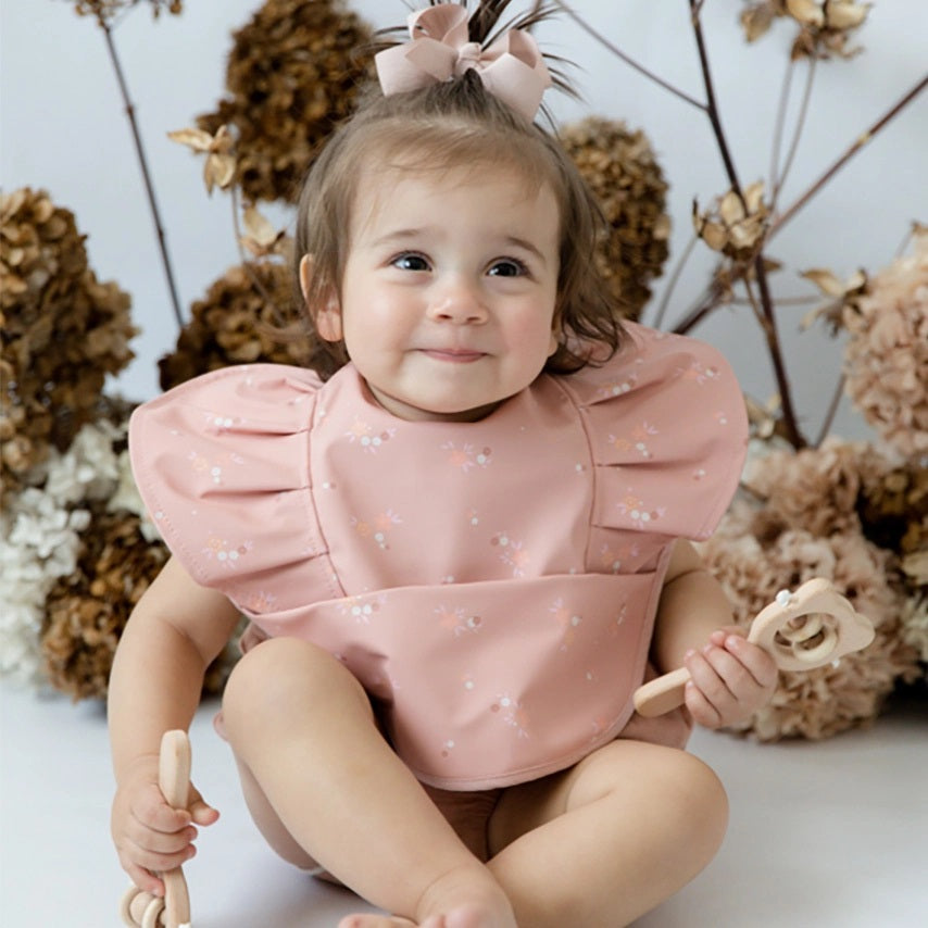 Snuggle Hunny Waterproof Frill Baby Bib - Daisy Pattern for Mess-Free Feeding & Playtime - Perfect for Infants, Toddlers, and Mealtime Adventures