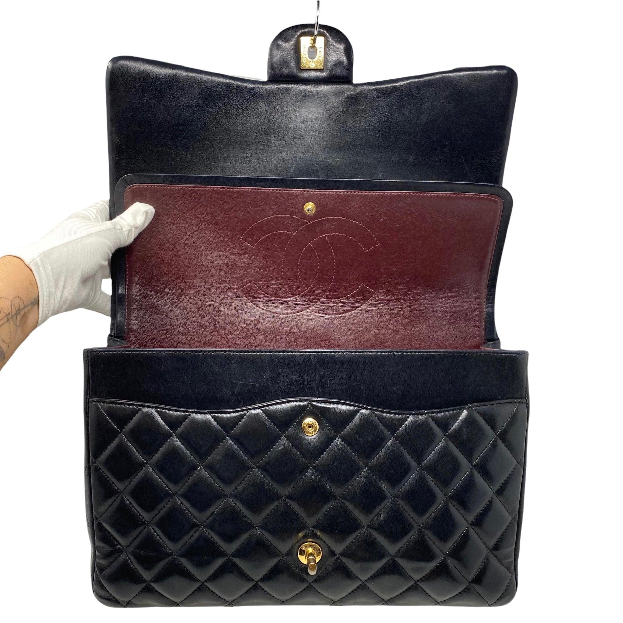Chanel Black Lambskin Maxi Classic Flap Bag - Luxury Designer Handbag for Women | Perfect for Evening Events, Parties & Special Occasions