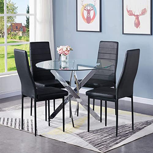 Sliver Table With Black Chairs