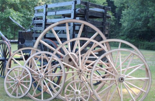 42 Inch Decorative Wood Wagon Wheel - Handcrafted Steam Bent Hickory with Wooden Hub - Perfect for Rustic Home Decor, Farmhouse Style, and Western Themed Parties