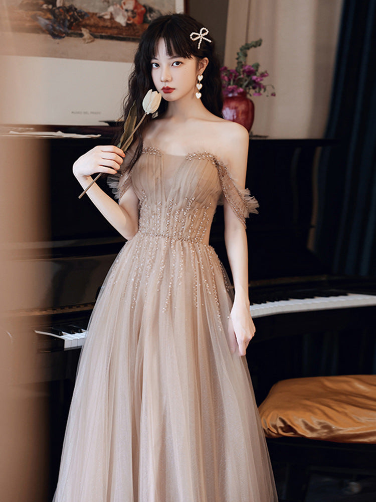 Elegant Champagne A-Line Tulle Prom Dress with Spaghetti Straps - Formal Evening Gown for Homecoming, Wedding, and Special Occasions - Style 307