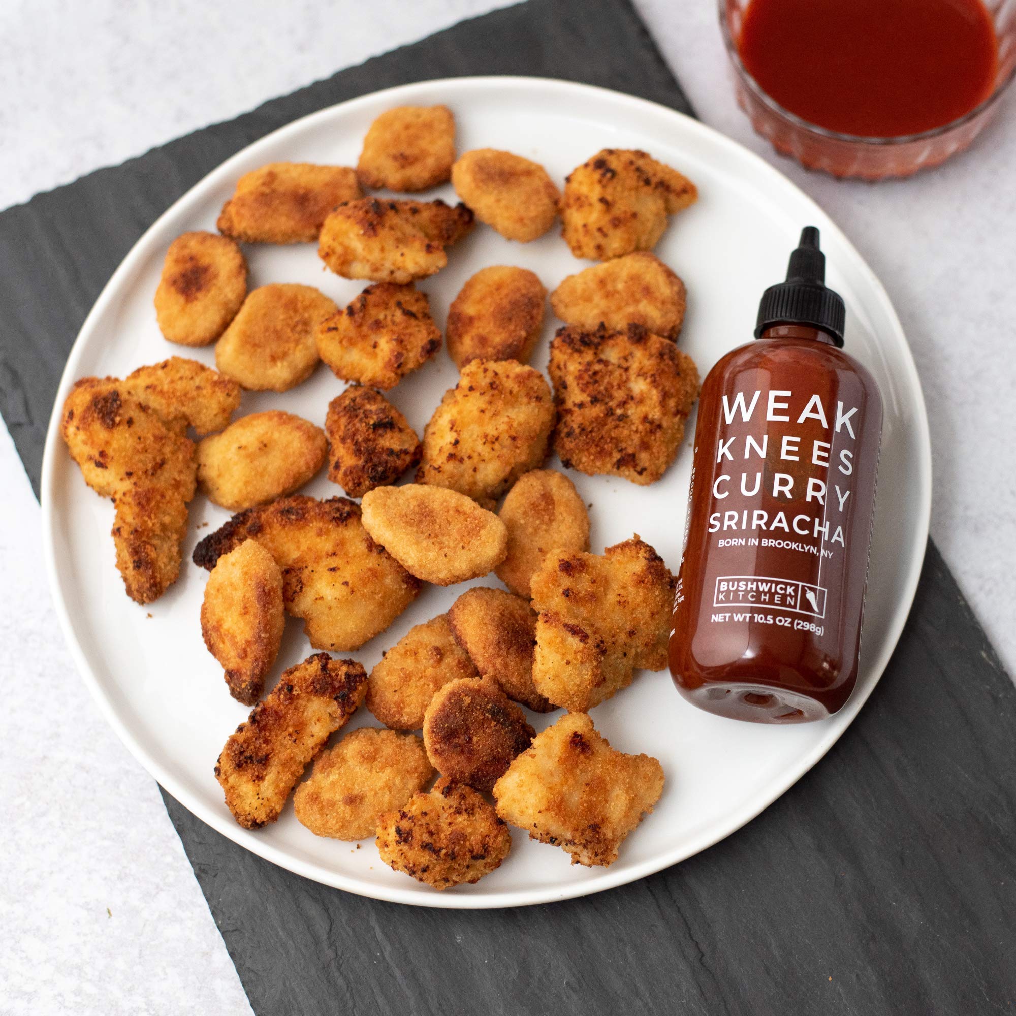Weak Knees Curry Sriracha Hot Sauce - 10.5oz Spicy Sriracha & Gochujang Chili Paste Blend with Curry Spices in Squeeze Bottle - Perfect for Wings, Tacos, Ramen & Foodie Gifts
