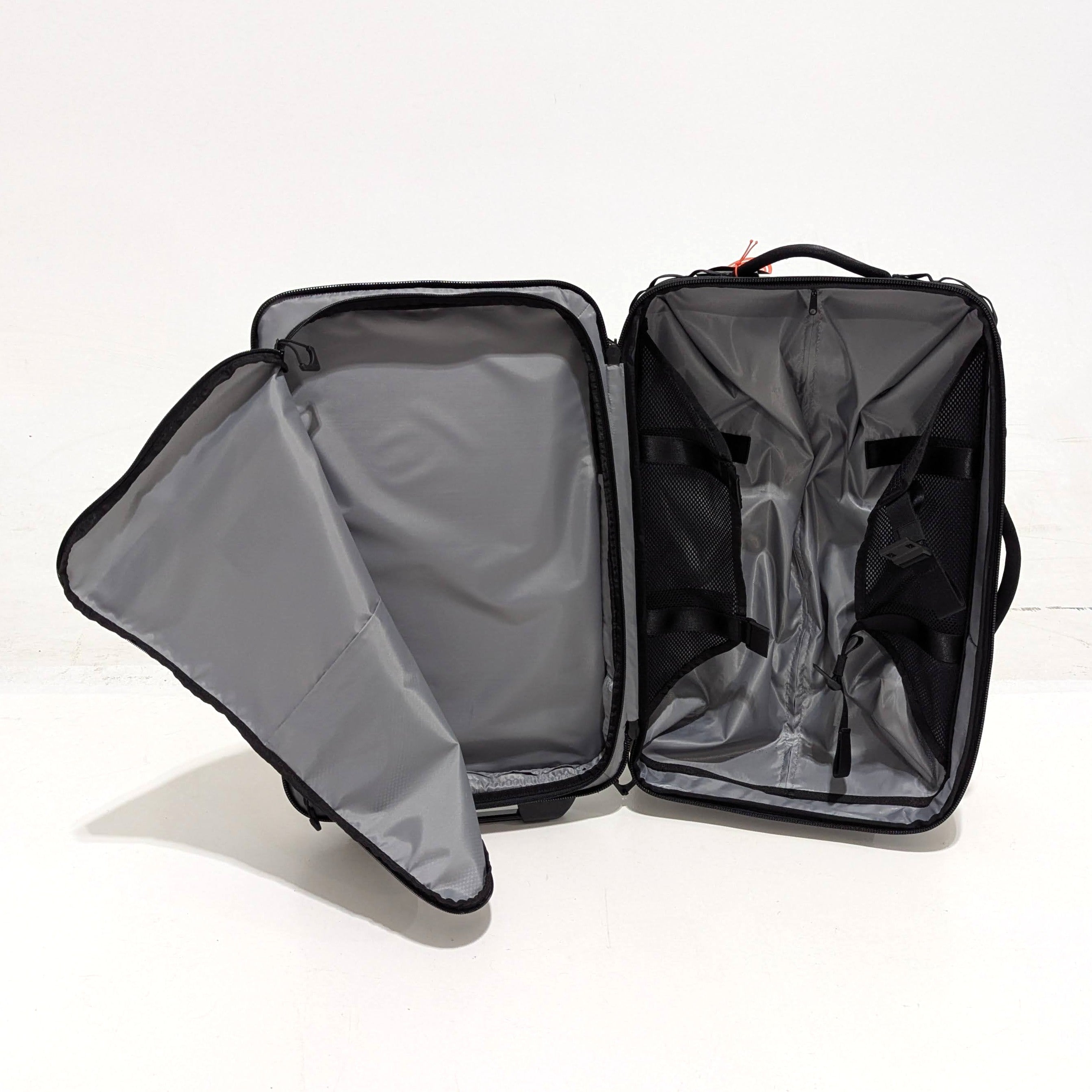 WANDRD Transit Carry On Roller Bag 40L - Black | Premium Used Luggage for Travel & Business Trips | Durable Spinner Suitcase with Smooth Wheels