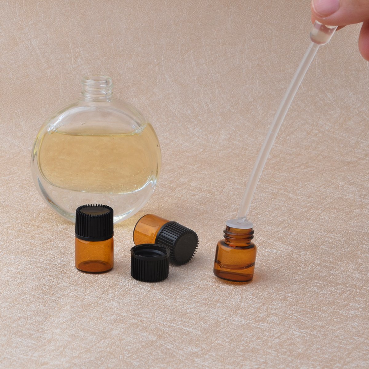 Enslz 100 Pcs 1ml Refillable Essential Oil Glass Bottles - Mini Empty Amber Glass Containers for Aromatherapy, Perfume & DIY Liquids - Perfect for Home Spa, Travel & Gift Making