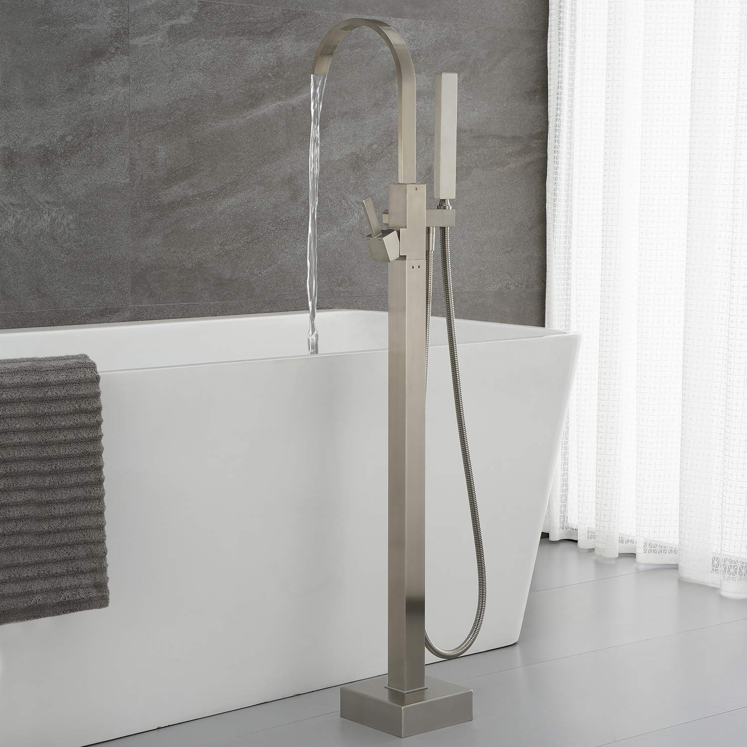 Freestanding Bathtub Faucet - Brushed Nickel Waterfall Tub Filler with Hand Shower, Single Handle Floor Mount Faucet for Modern Bathroom Decor | Perfect for Spa-Like Relaxation and Luxury Bath Experience