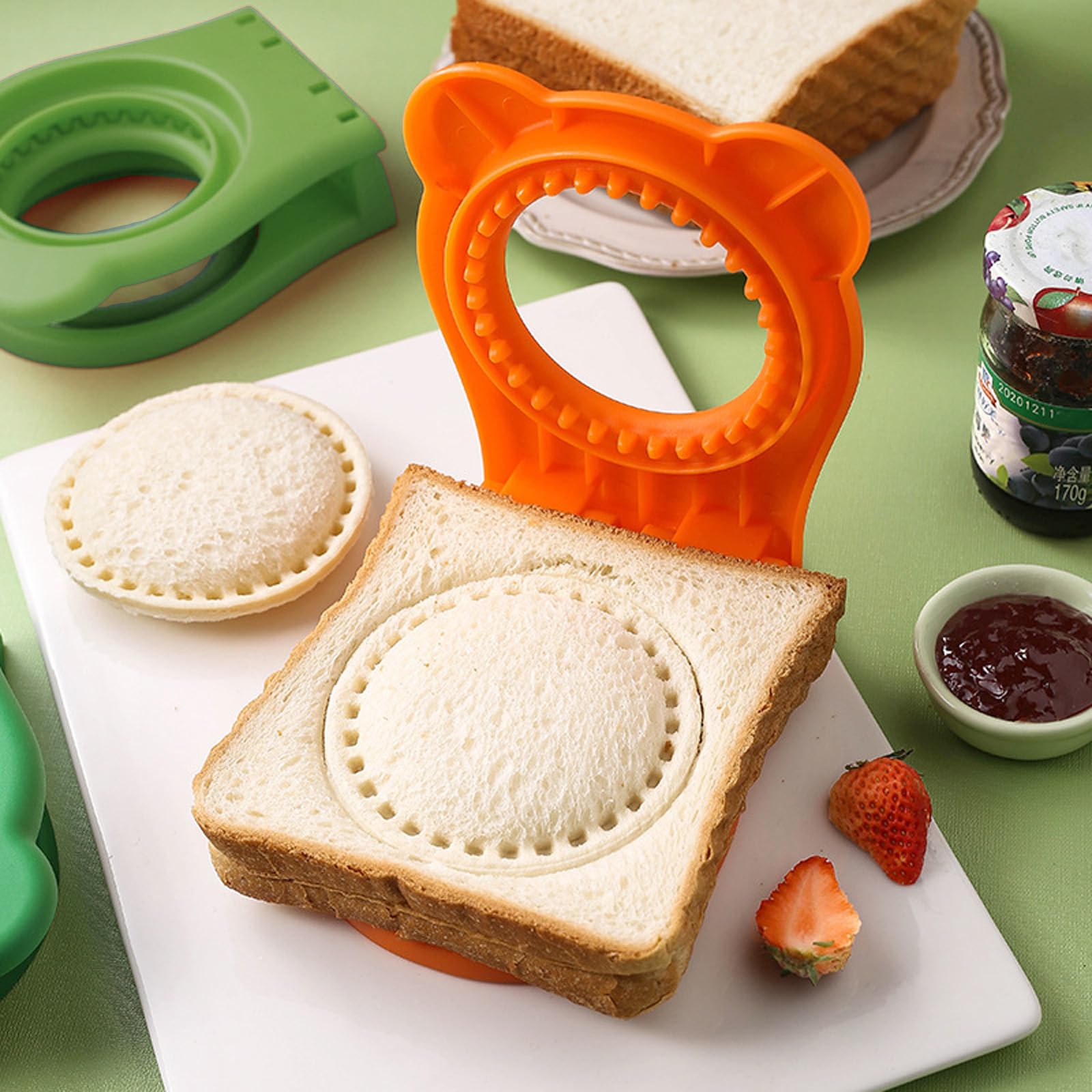 Uncrushable Sandwich Maker & Sealer - Round Sandwich Cutter with Full Hand Protection, Bread Mold for Perfect Sandwiches (Green & Orange) - Ideal for School Lunches, Picnics & Quick Meals
