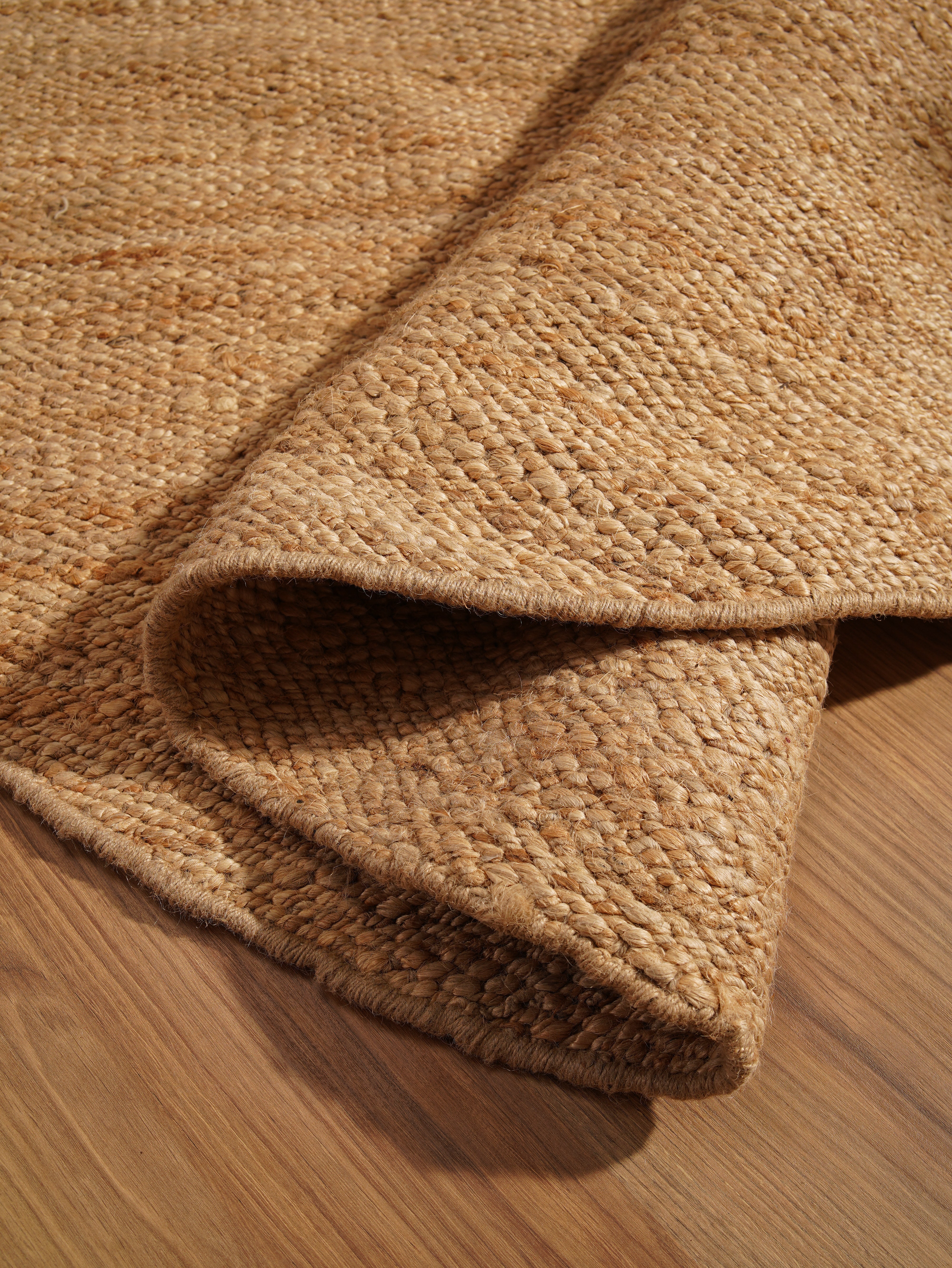 Classic Handwoven Jute Braided Rug - Natural Fiber Floor Mat for Living Room, Bedroom, or Entryway - Eco-Friendly Home Decor