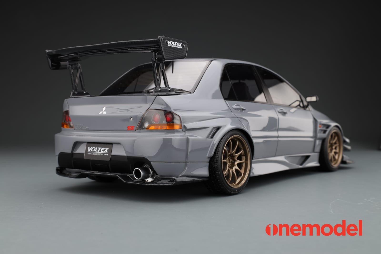 1:18 Scale Mitsubishi Lancer Evolution IX Voltex Model Car with Carbon Fiber Hood - Cement Gray Color - Perfect for Diecast Collectors, Car Enthusiasts, and Home/Office Display