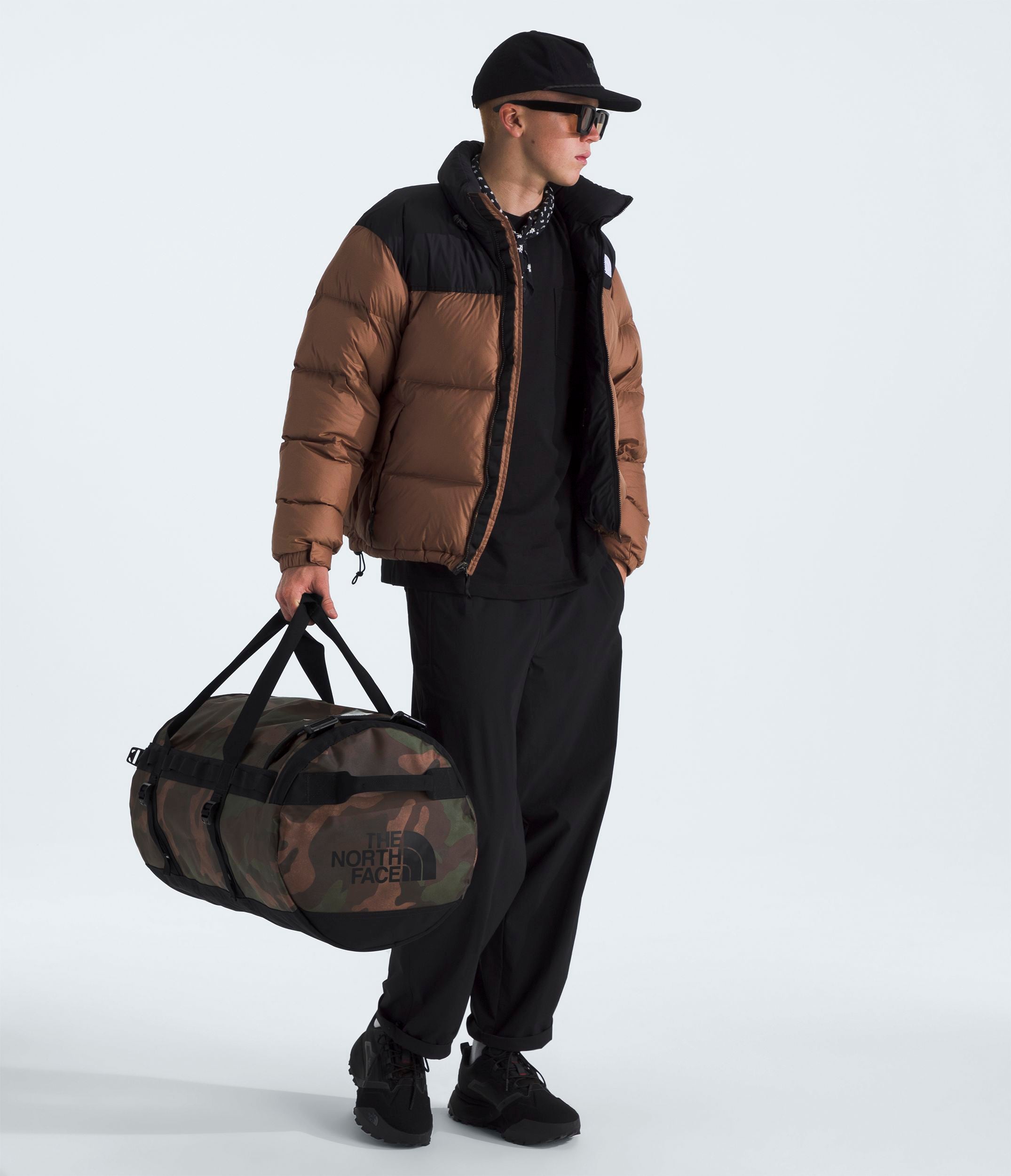 The North Face Base Camp Duffel Bag - Medium Size Travel Duffel for Camping, Hiking & Outdoor Adventures - Water-Resistant Gear Bag for Gym, Work & Weekend Trips