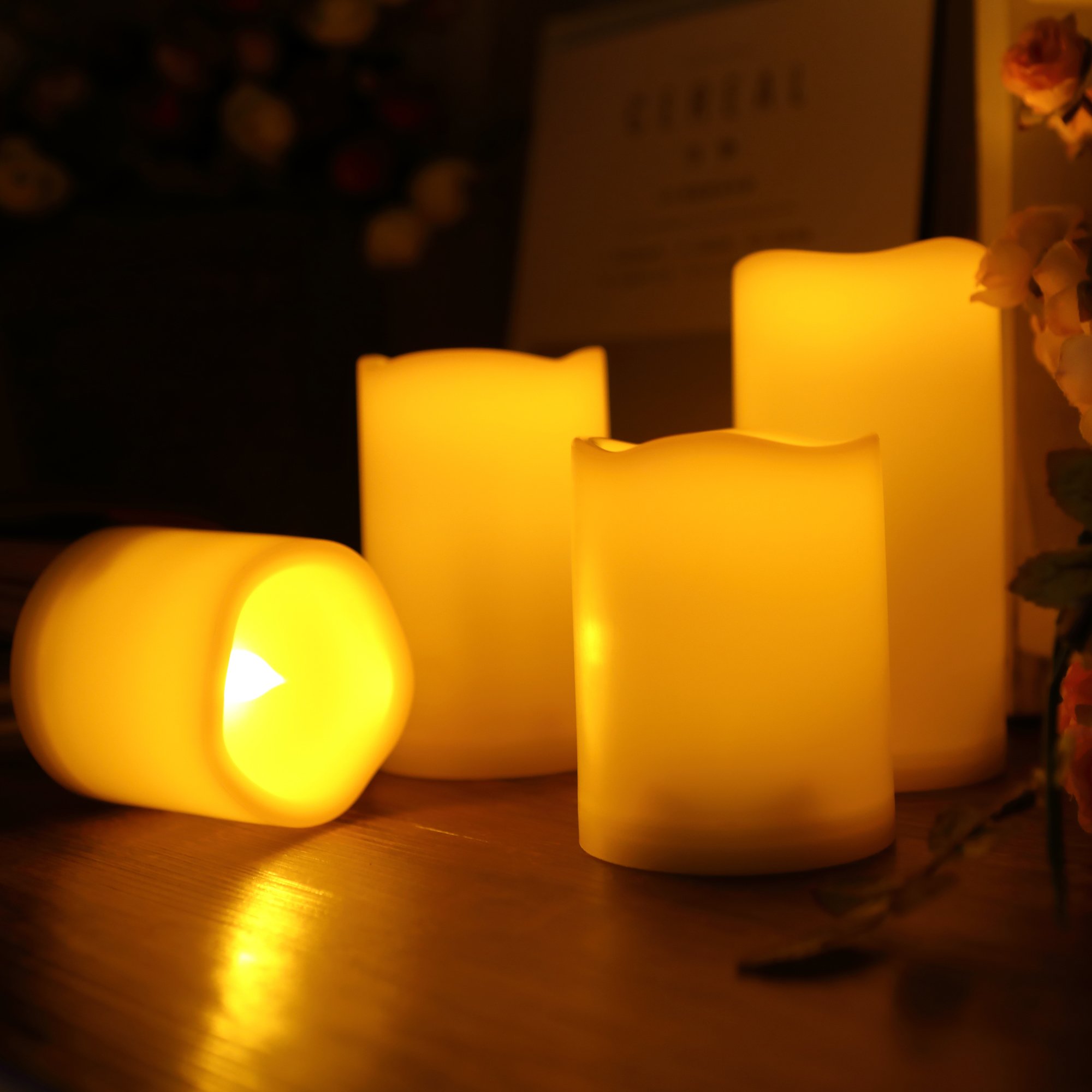 Waterproof Flameless LED Candles with Timer - 4 Pack Realistic Flickering Battery Operated Pillar Lights for Outdoor, Garden, Wedding & Christmas Decorations - Perfect for Lanterns, Centerpieces and Romantic Ambiance