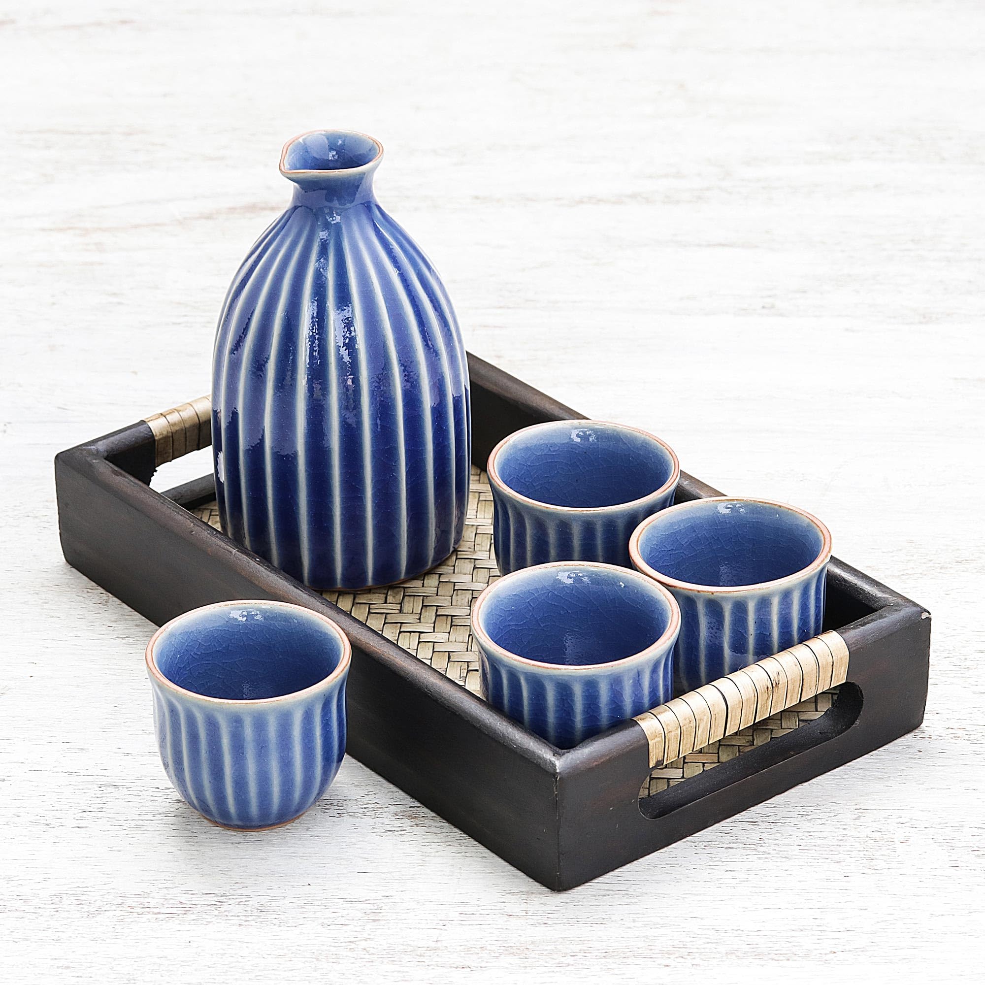 NOVICA Handmade Celadon Ceramic Sake Set - Blue Japanese Style Decanter with 4 Cups & Wood Tray - Traditional Thai Tableware for Sake, Wine & Tea - Perfect for Dinner Parties, Gifts & Home Decor (Decanter 5.5