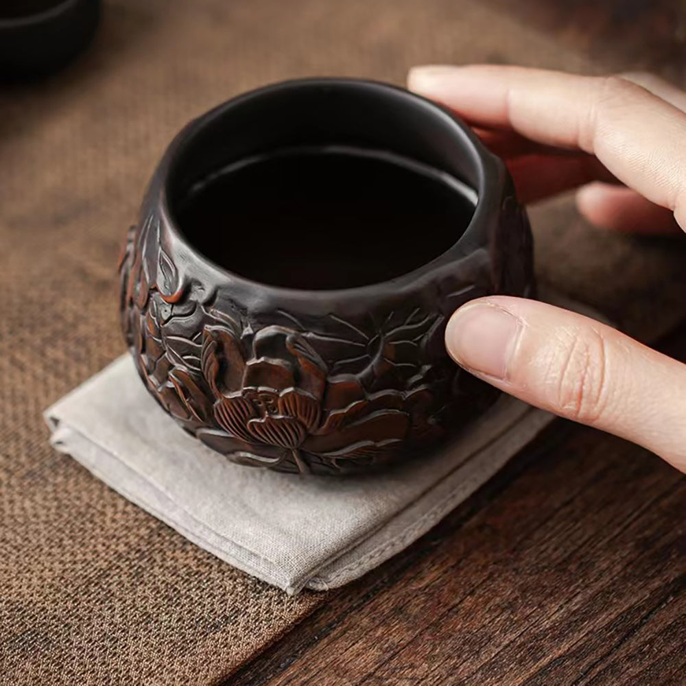 Handmade Black Pottery Relief Lotus Kung Fu Tea Cup - Traditional Chinese Ceramic Tea Set for Gongfu Tea Ceremony, Meditation & Zen Decor