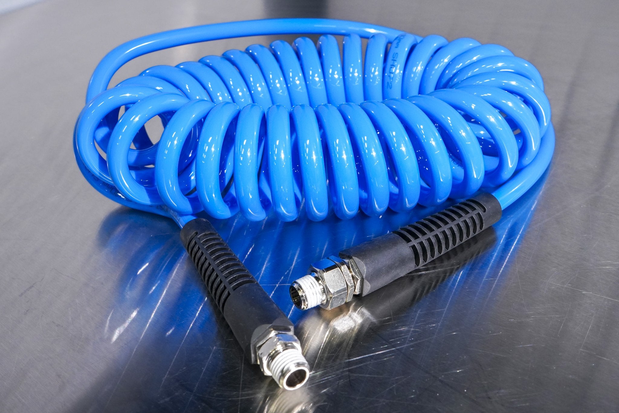 Prevost Spiral Hose with Fixed & Rotating 1/4