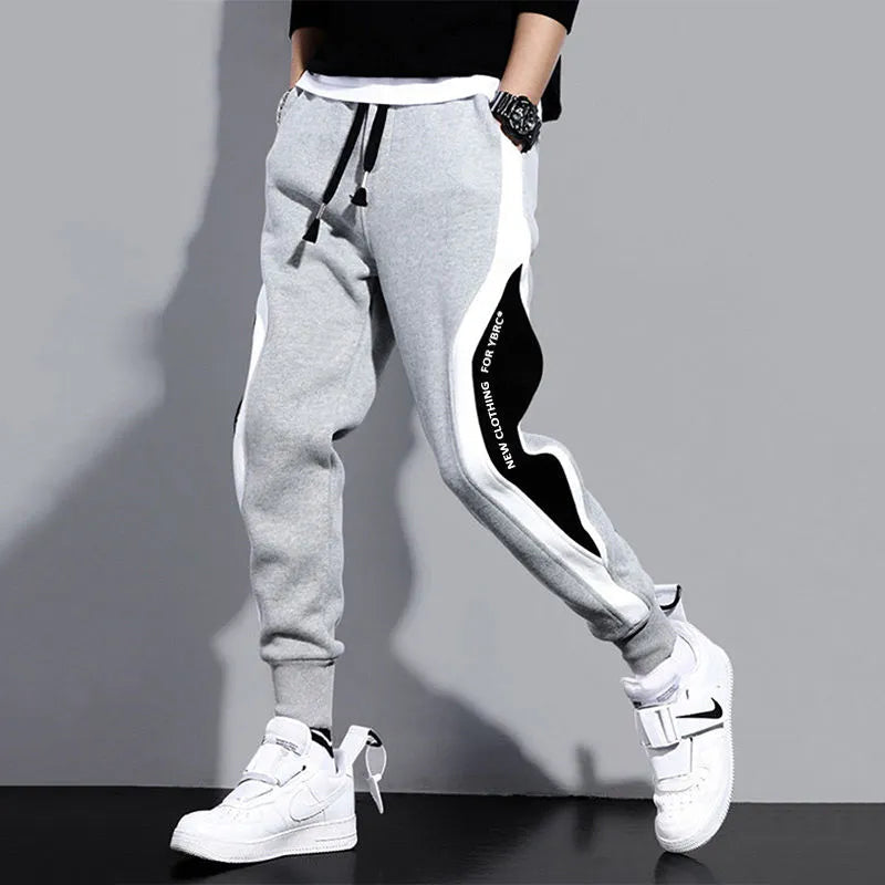 **Men's Wide Loose Casual Pants - Elastic Waist, Breathable Patchwork Nine-Point Trousers for Sports & Outdoor Activities | Perfect for Jogging, Travel, and Everyday Wear**