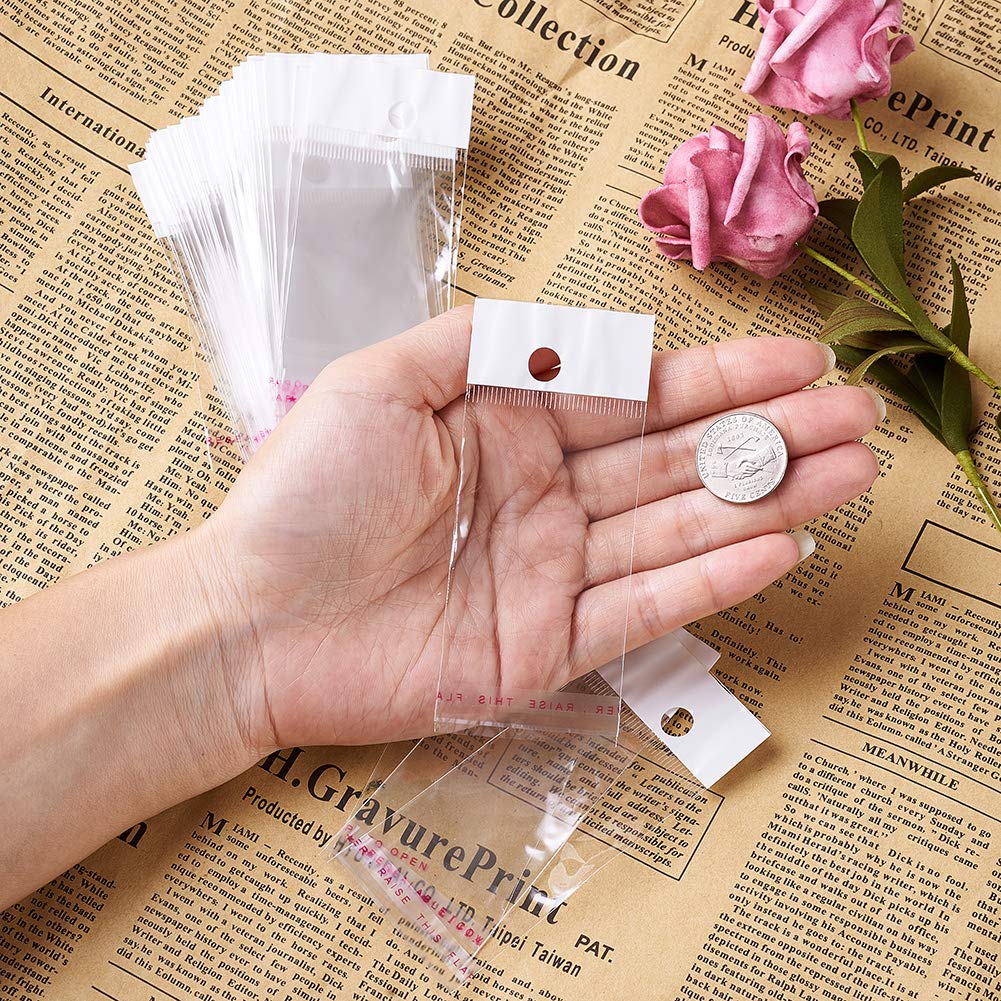 200pcs 2.36x1.57inch OPP Clear Resealable Plastic Bags with Self-Adhesive Seal - Perfect for Bakery, Candy, Soap, Cookies & Chocolate Packaging (6x4cm with Hole) - Food Safe Storage & Gift Wrapping Solution