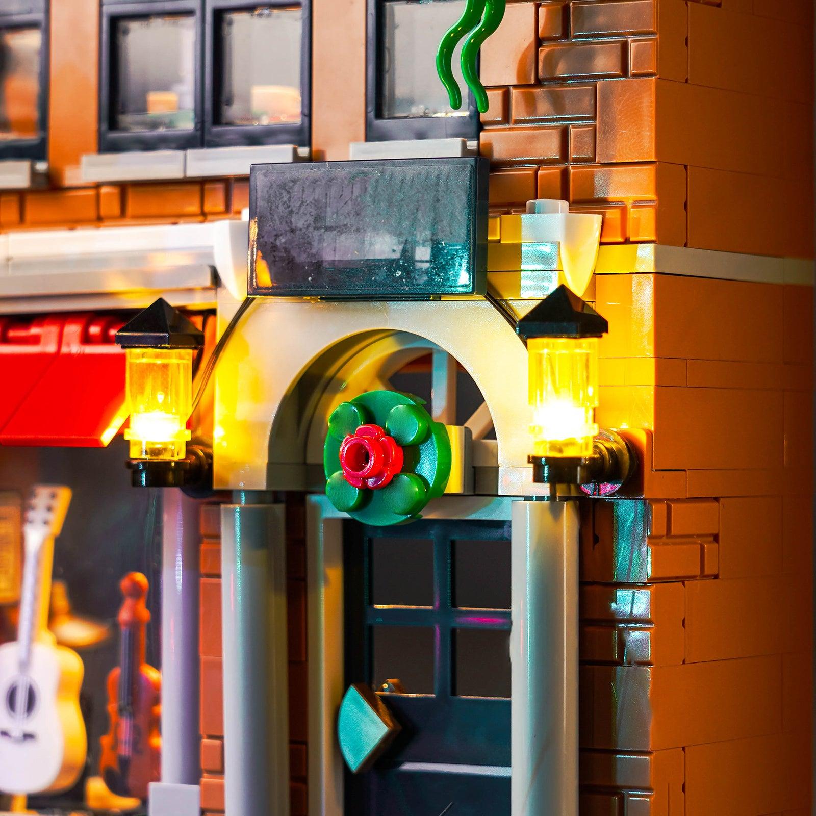 LEGO Holiday Main Street ICONS 10308 Building Kit with LED Lights - Christmas Village Display & Winter Holiday Decor for Home & Office