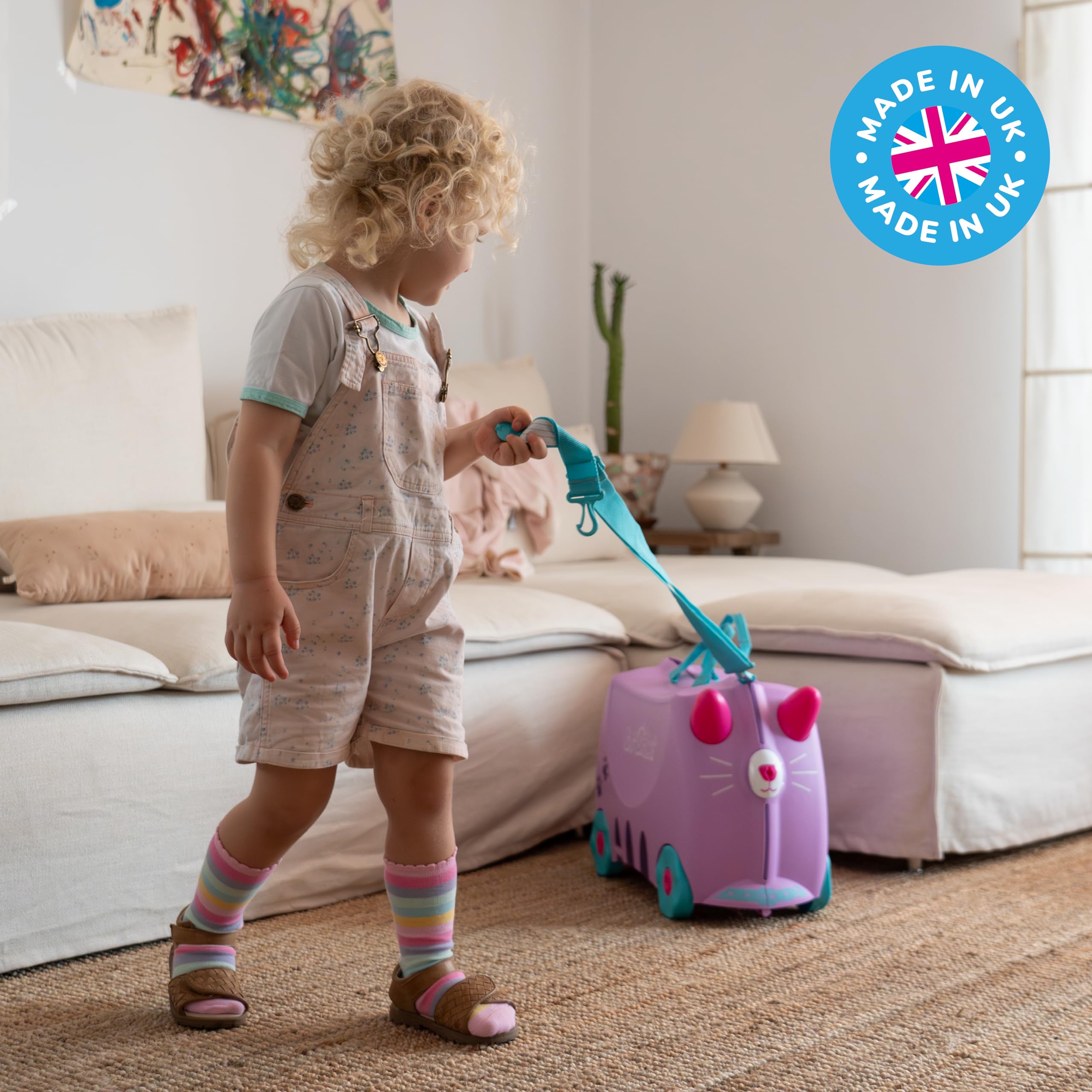 Trunki Ride-On Kids Suitcase - Toddler Luggage with Wheels, Carry-On Travel Bag for Airplane - Cute Cassie Cat Lilac Design - Perfect for Family Trips, Air Travel & Preschool Adventures