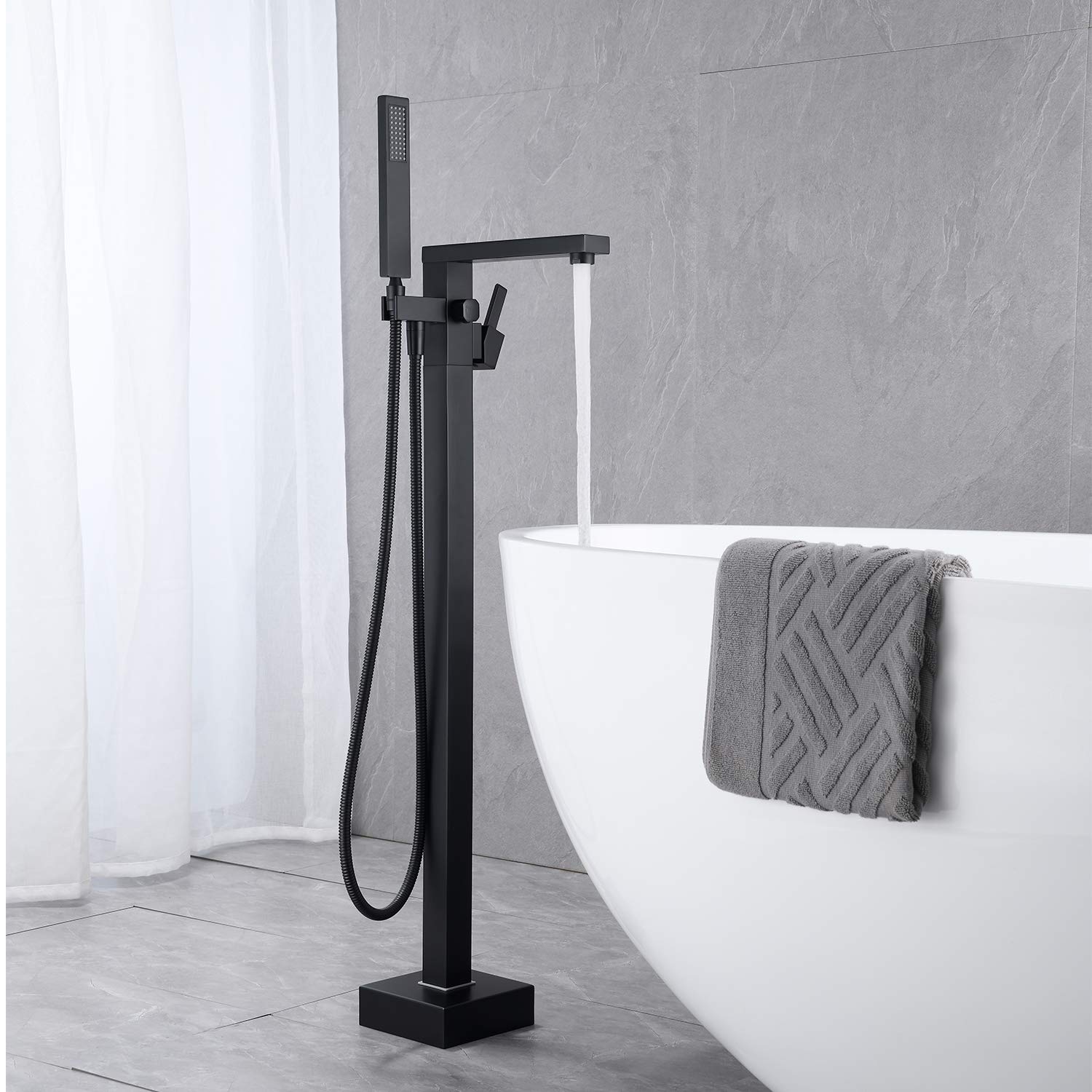 Freestanding Bathtub Faucet - Black Floor Mount Brass Tub Filler with Hand Shower | Single Handle Bathroom Faucet for Modern & Luxury Bathrooms | Perfect for Spa, Master Bath & Freestanding Tubs