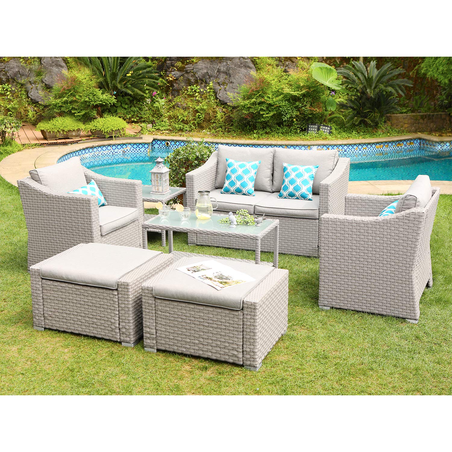 7-Piece Outdoor Patio Furniture Set - All-Weather Wicker Sectional Sofa with Thick Cushions, Coffee Table, Glass-Top Table & 2 Ottomans - Includes 4 Teal Pattern Pillows - Perfect for Poolside, Lawn, Backyard & Garden Relaxation