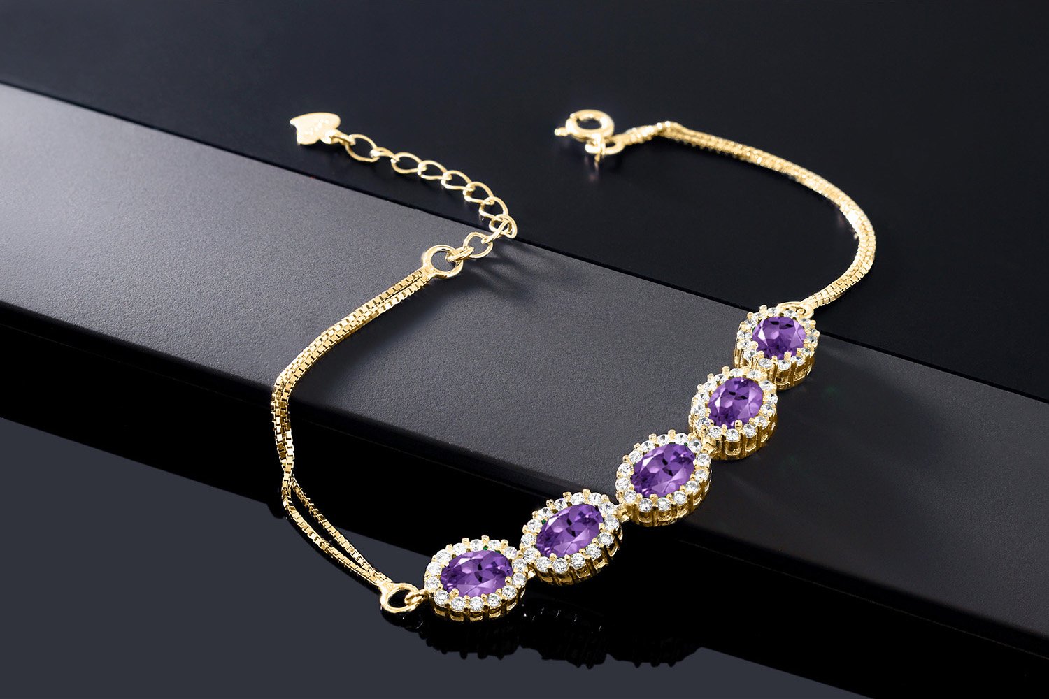 Gem Stone King 7X5MM Oval Cut Birthstone Tennis Bracelet for Women - 18K Gold Plated Sterling Silver | 7 Inch Adjustable Length with 1.5 Inch Extender | Elegant Jewelry Gift for Mom, Wife, Girlfriend | Perfect for Anniversaries, Birthdays & Special Occasions