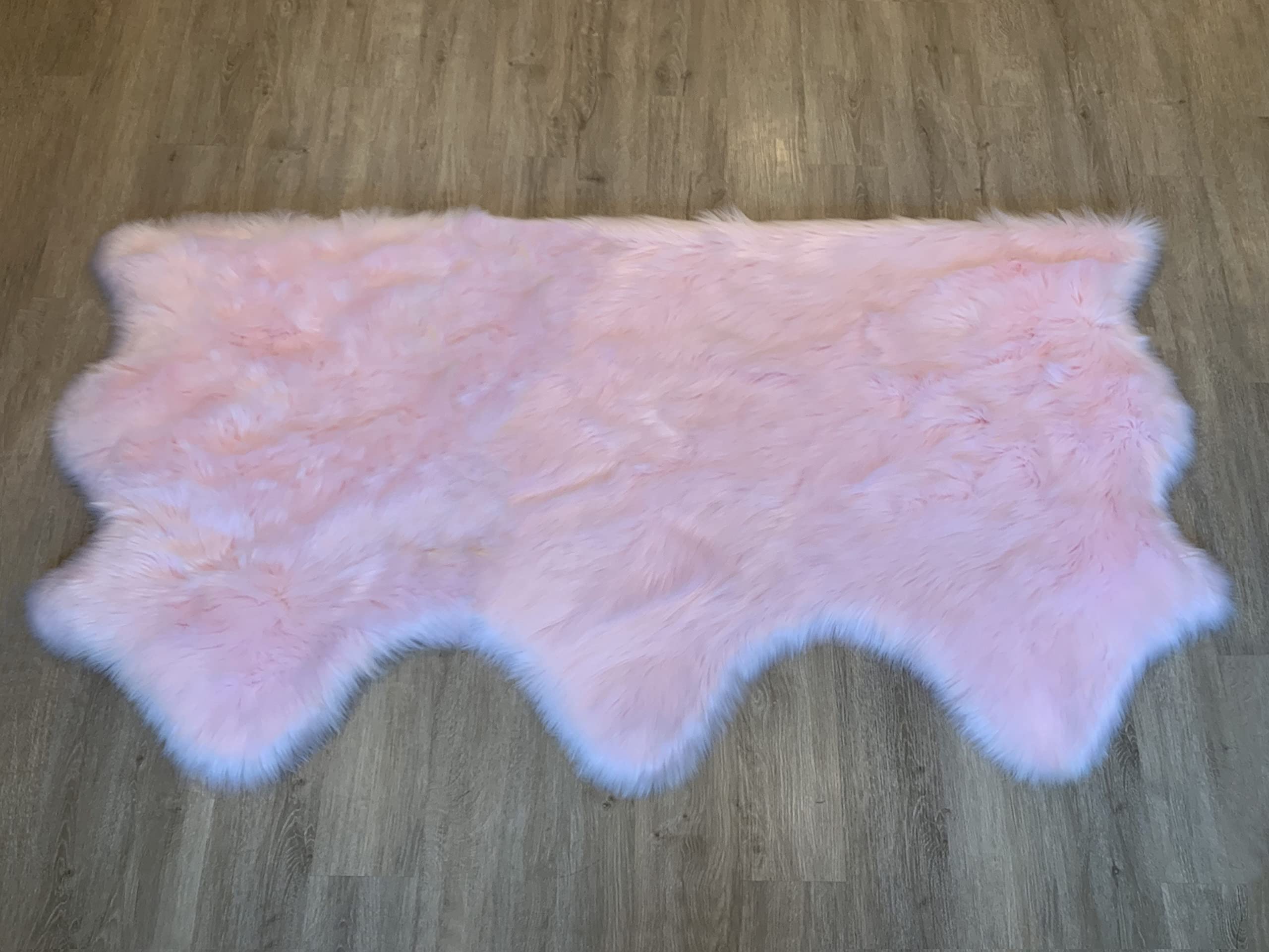 LAMBZY Faux Sheepskin Rug - Super Soft Hypoallergenic Shaggy Carpet for Living Room, Nursery, Bedroom & Sofa - Pink Free Shape 3x6 Feet - Cozy Home Decor, Perfect for Kids Play Area & Winter Floor Mat