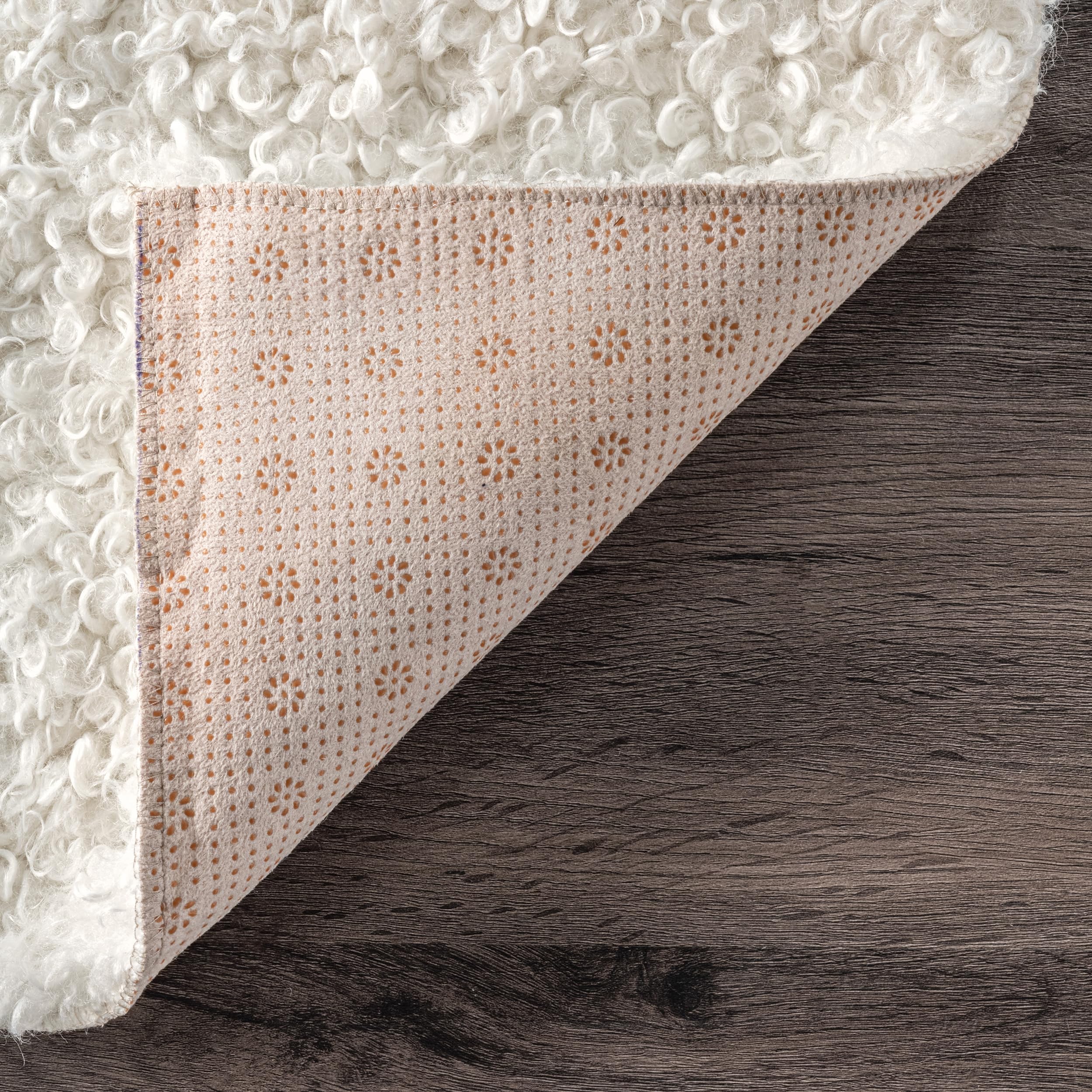 nuLOOM Marlow Machine Washable Soft Shaggy Faux Sheepskin Area Rug, 6x9 Feet, White - Plush Living Room Rug for Cozy Bedroom & Nursery Decor