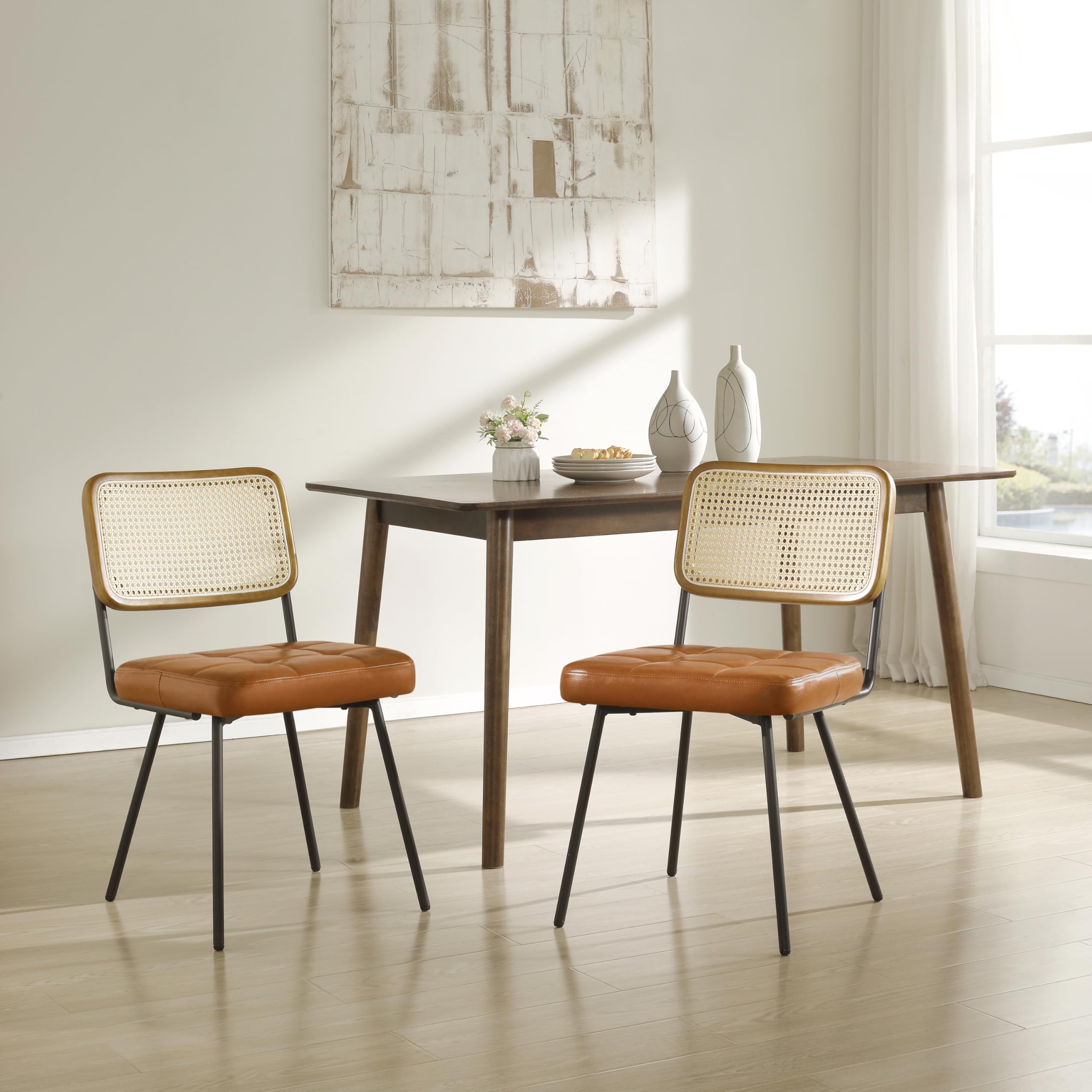 Art Leon Rattan Dining Chairs Set of 2 - Mid Century Modern Kitchen & Dining Room Chairs with Woven Rattan Back, Faux Leather Seat & Black Metal Legs - Sturdy Rubber Wood Frame in Yellow Brown - Perfect for Breakfast Nook, Bistro, Patio & Small Space Dining