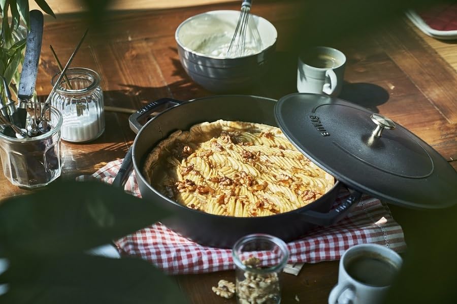 STAUB 28cm Round Cast Iron Dutch Oven with Lid - Black Enameled Cookware for All Cooktops, Heat Retention, Oven Safe to 500°F | Perfect for Braising, Stewing, Baking Bread & Serving | Made in France | Ideal for Home Chefs & Gourmet Cooking