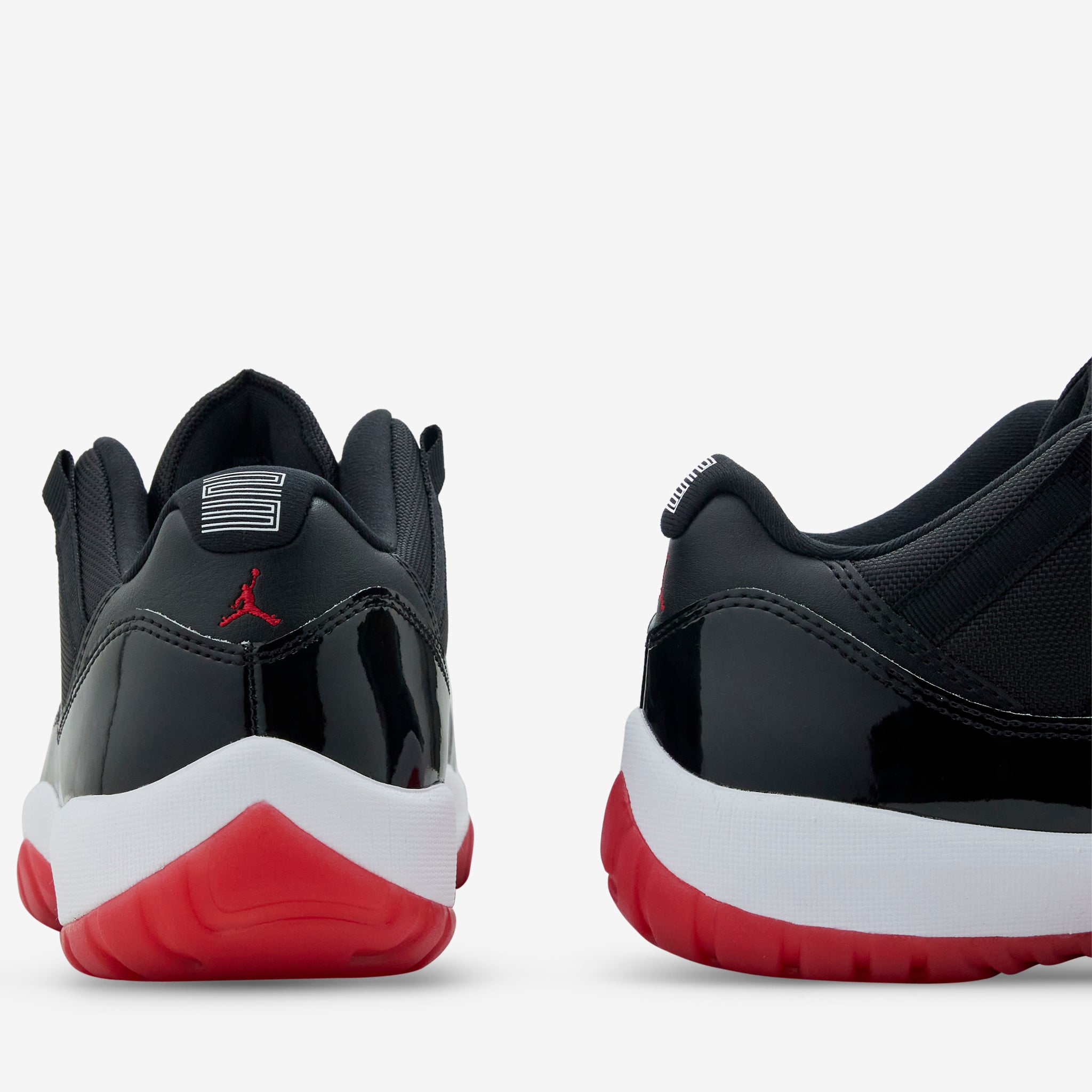 Air Jordan 11 Retro Low 'Bred' Men's Basketball Shoes - Black/Varsity Red/White | Classic Sneakers for Streetwear & Court Performance