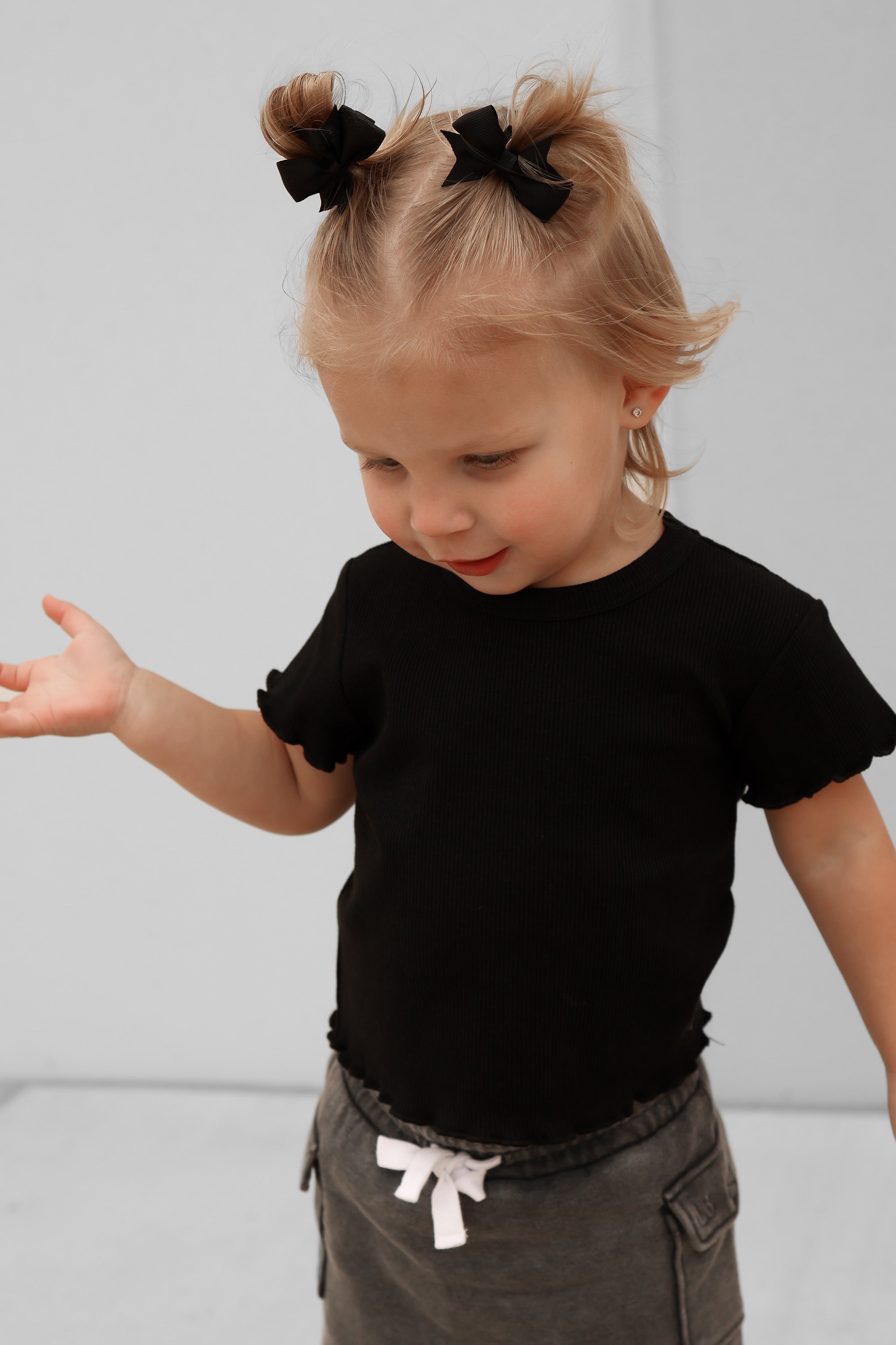 Stylish Ribbed Lettuce Trim Tee in Black - Perfect for Casual Outfits, Layering & Everyday Wear