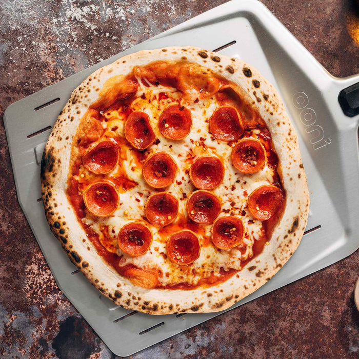 Ooni Perforated Pizza Peel - Premium Aluminum Pizza Paddle for Outdoor Wood Fired Ovens - Perfect for Neapolitan & Artisan Pizza Making at Home or Restaurant Use